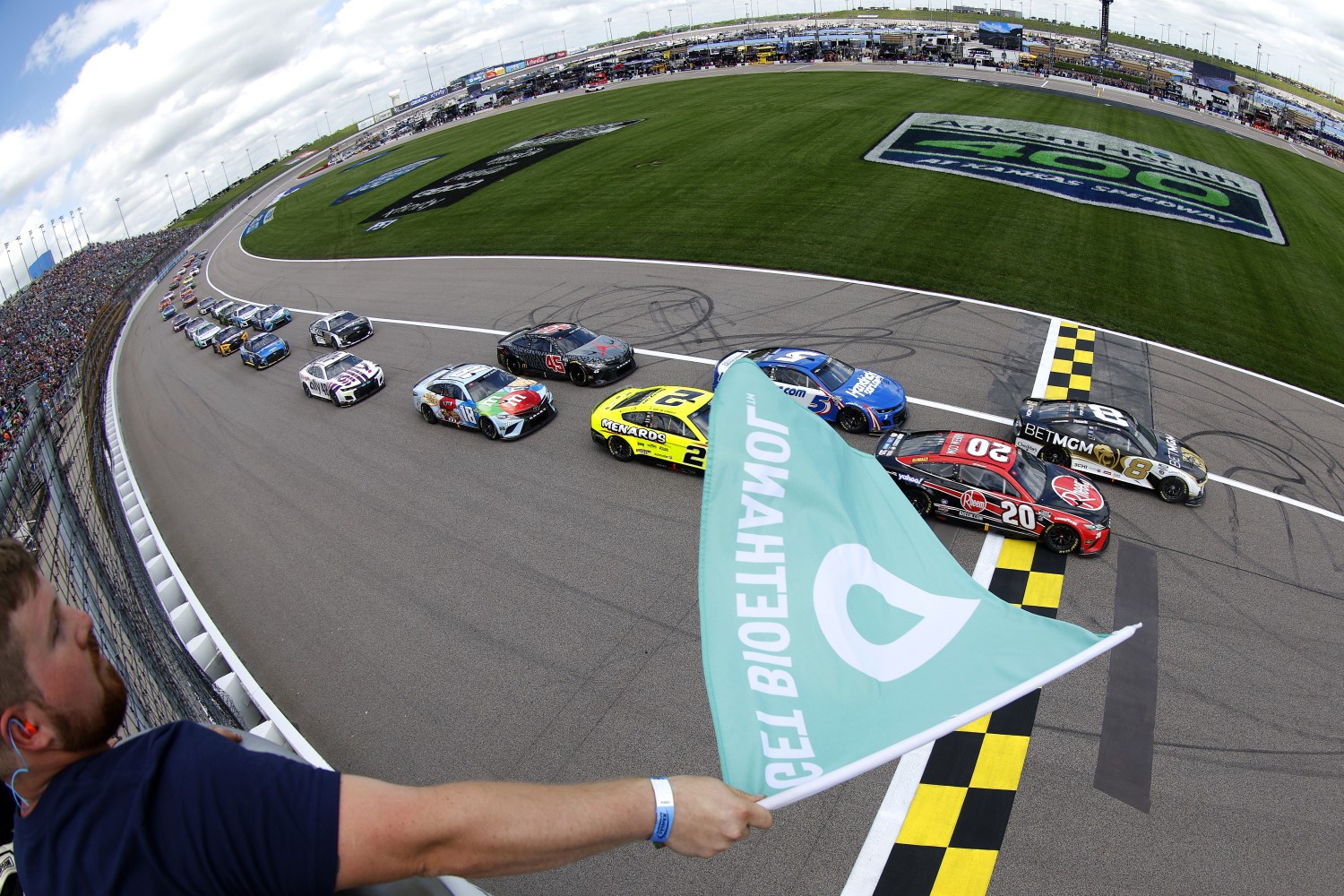 Christopher Bell, driver of the #20 Rheem Toyota, leads the field to the green flag to start the NASCAR Cup Series AdventHealth 400 at Kansas Speedway on May 15, 2022 in Kansas City, Kansas. (Photo by Sean Gardner/Getty Images)