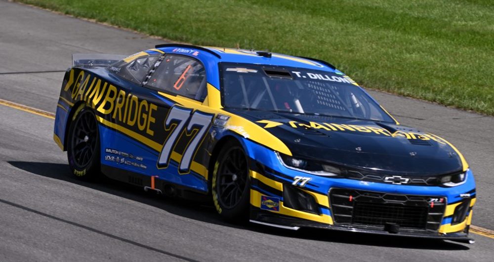 Ty Dillon, driver of the #77 Gainbridge Chevrolet, drives during practice for the NASCAR Cup Series HighPoint.com 400 at Pocono Raceway on July 22, 2023 in Long Pond, Pennsylvania. (Photo by Logan Riely/Getty Images) | Getty Images