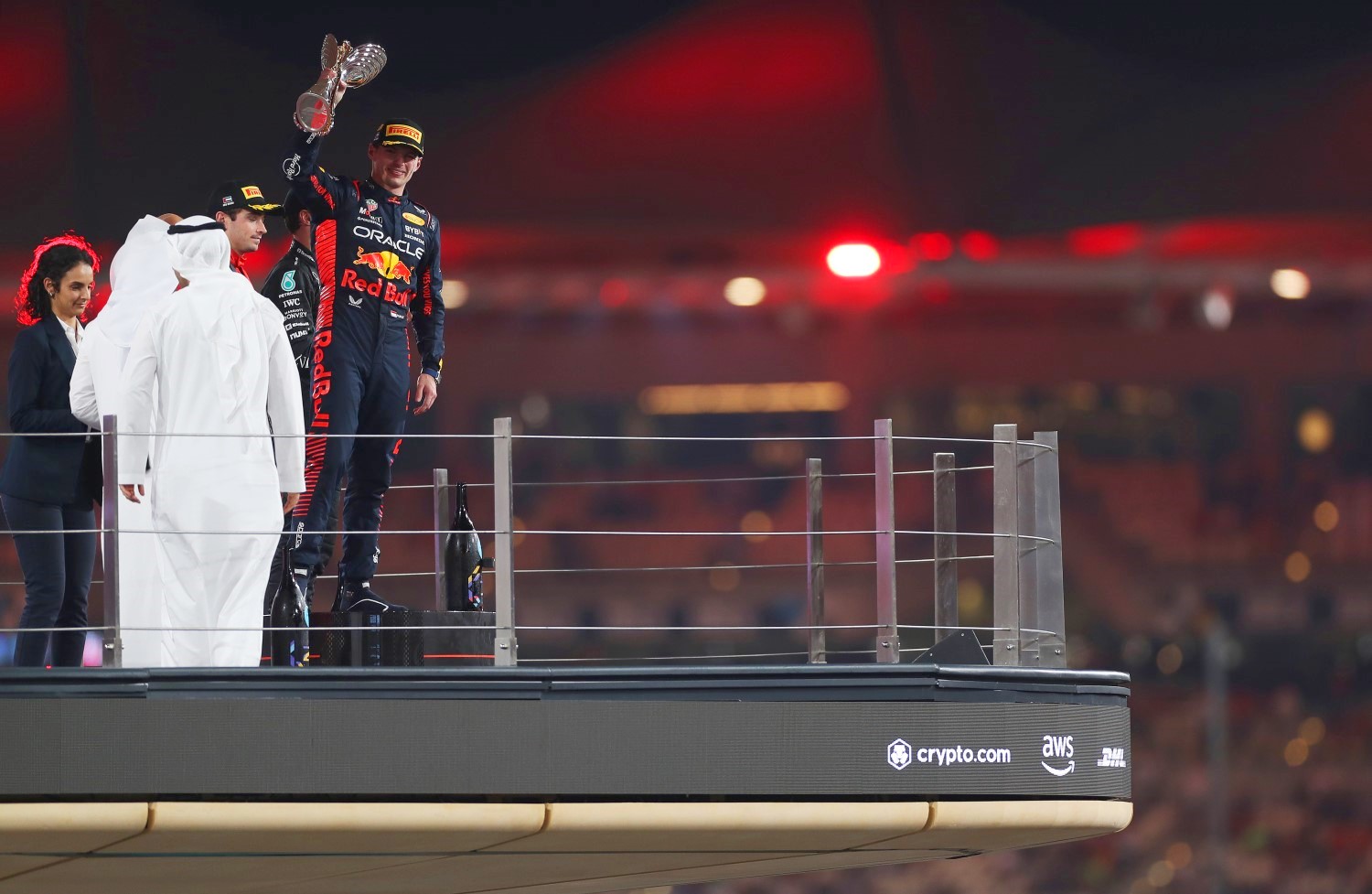 Race winner Max Verstappen of the Netherlands and Oracle Red Bull Racing celebrates on the podium during the F1 Grand Prix of Abu Dhabi at Yas Marina Circuit on November 26, 2023 in Abu Dhabi, United Arab Emirates. (Photo by Peter Fox/Getty Images) // Getty Images / Red Bull Content Pool