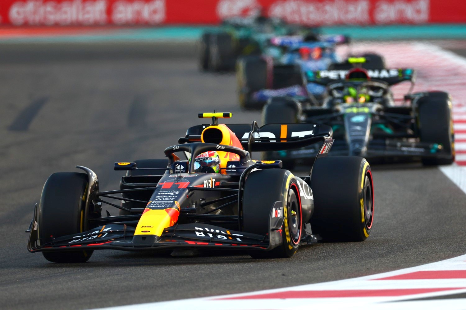 Sergio Perez of Mexico driving the (11) Oracle Red Bull Racing RB18 on track during the F1 Grand Prix of Abu Dhabi at Yas Marina Circuit on November 26, 2023 in Abu Dhabi, United Arab Emirates. (Photo by Clive Rose/Getty Images) // Getty Images / Red Bull Content Pool 