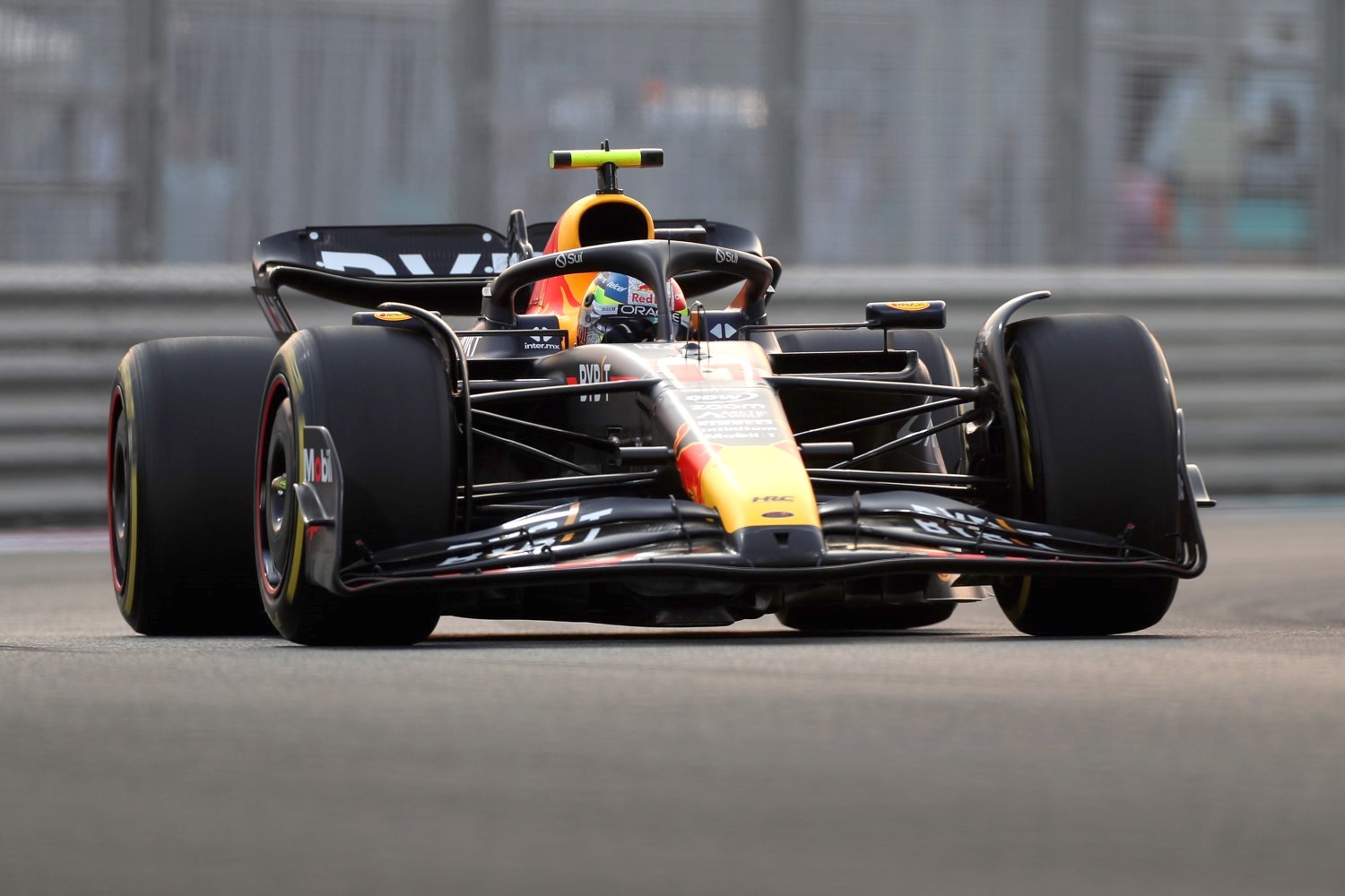 Sergio Perez of Mexico driving the (11) Oracle Red Bull Racing RB19 on track during practice ahead of the F1 Grand Prix of Abu Dhabi at Yas Marina Circuit on November 24, 2023 in Abu Dhabi, United Arab Emirates. (Photo by Peter Fox/Getty Images) // Getty Images / Red Bull Content Pool