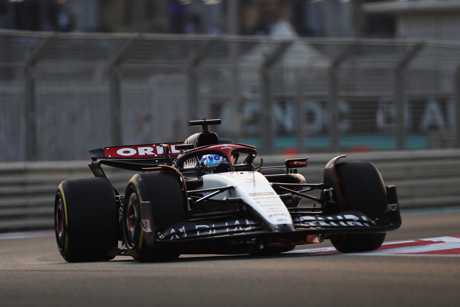 Daniel Ricciardo of Australia driving the (3) Scuderia AlphaTauri AT04 on track during practice ahead of the F1 Grand Prix of Abu Dhabi at Yas Marina Circuit on November 24, 2023 in Abu Dhabi, United Arab Emirates. (Photo by Peter Fox/Getty Images) // Getty Images / Red Bull Content Pool