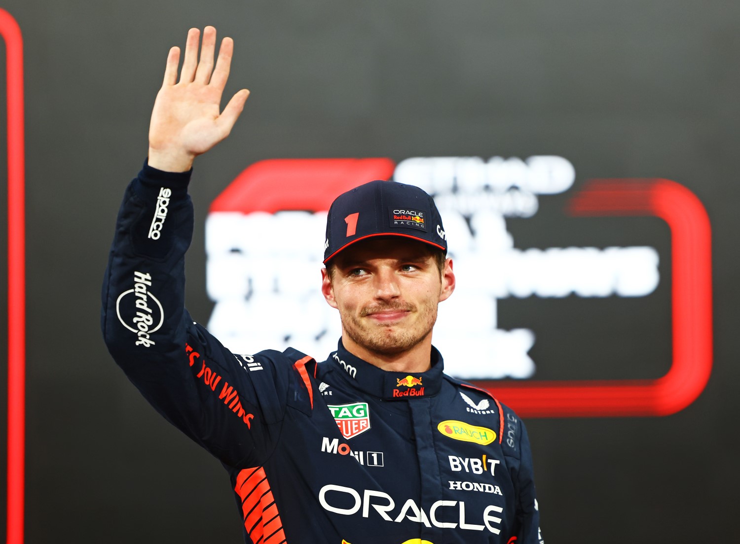 Pole position qualifier Max Verstappen of the Netherlands and Oracle Red Bull Racing celebrates in parc ferme during qualifying ahead of the F1 Grand Prix of Abu Dhabi at Yas Marina Circuit on November 25, 2023 in Abu Dhabi, United Arab Emirates. (Photo by Mark Thompson/Getty Images) // Getty Images / Red Bull Content Pool