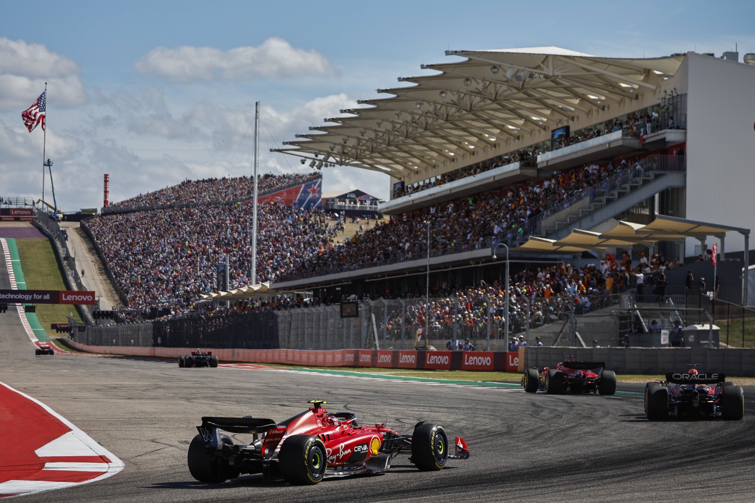 Carlos Sainz of Spain driving (55) the Ferrari SF-23 chases Max Verstappen of the Netherlands driving the (1) Oracle Red Bull Racing RB19 and Charles Leclerc of Monaco driving the (16) Ferrari SF-23 on track during the F1 Grand Prix of United States at Circuit of The Americas on October 22, 2023 in Austin, Texas. (Photo by Chris Graythen/Getty Images)