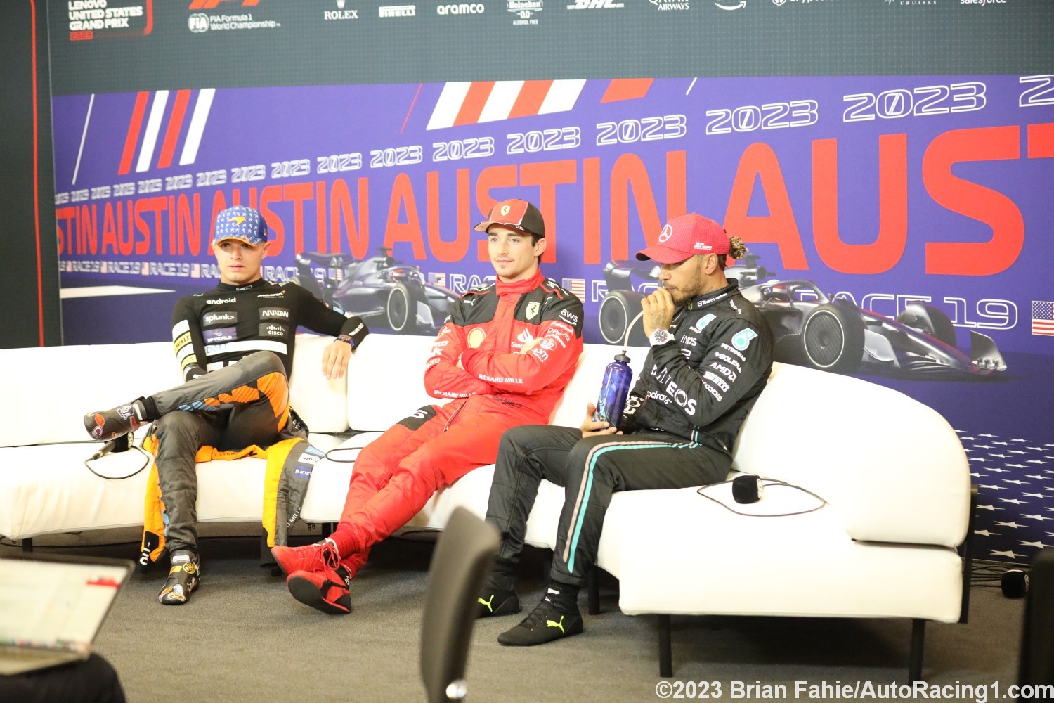 L to R: Lando Norris, Charles Leclerc and Lewis Hamilton