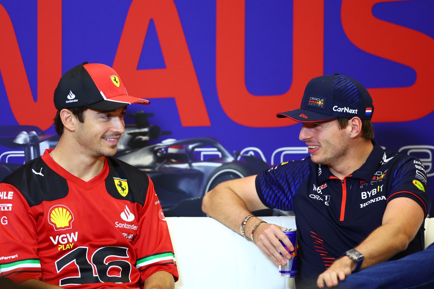 Charles Leclerc of Monaco and Ferrari and Max Verstappen of the Netherlands and Oracle Red Bull Racing talk in the Drivers Press Conference during previews ahead of the F1 Grand Prix of United States at Circuit of The Americas on October 19, 2023 in Austin, Texas. (Photo by Dan Istitene/Getty Images) // Getty Images / Red Bull Content Pool