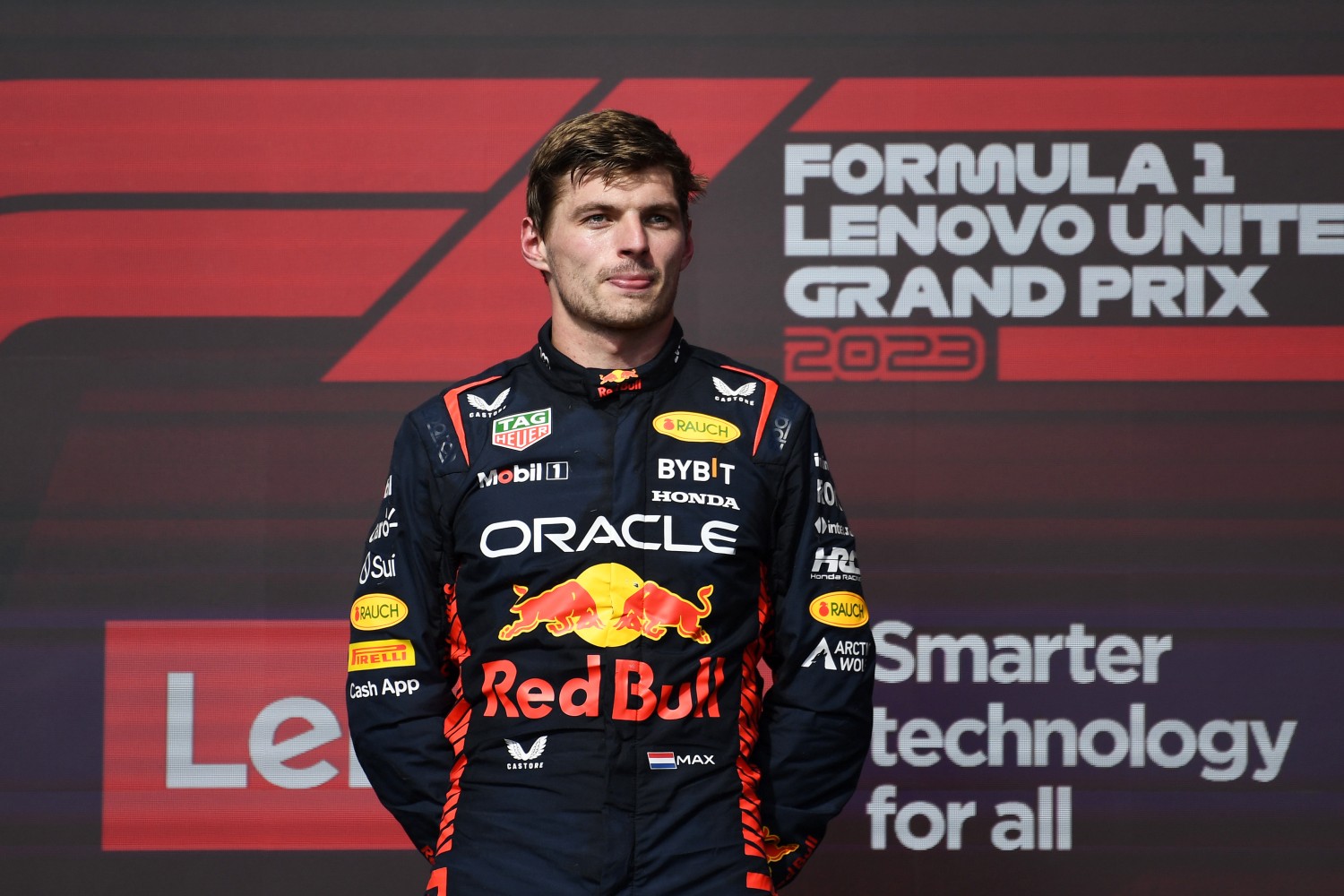 Race winner Max Verstappen of the Netherlands and Oracle Red Bull Racing celebrates on the podium following the F1 Grand Prix of United States at Circuit of The Americas on October 22, 2023 in Austin, Texas. (Photo by Rudy Carezzevoli/Getty Images)