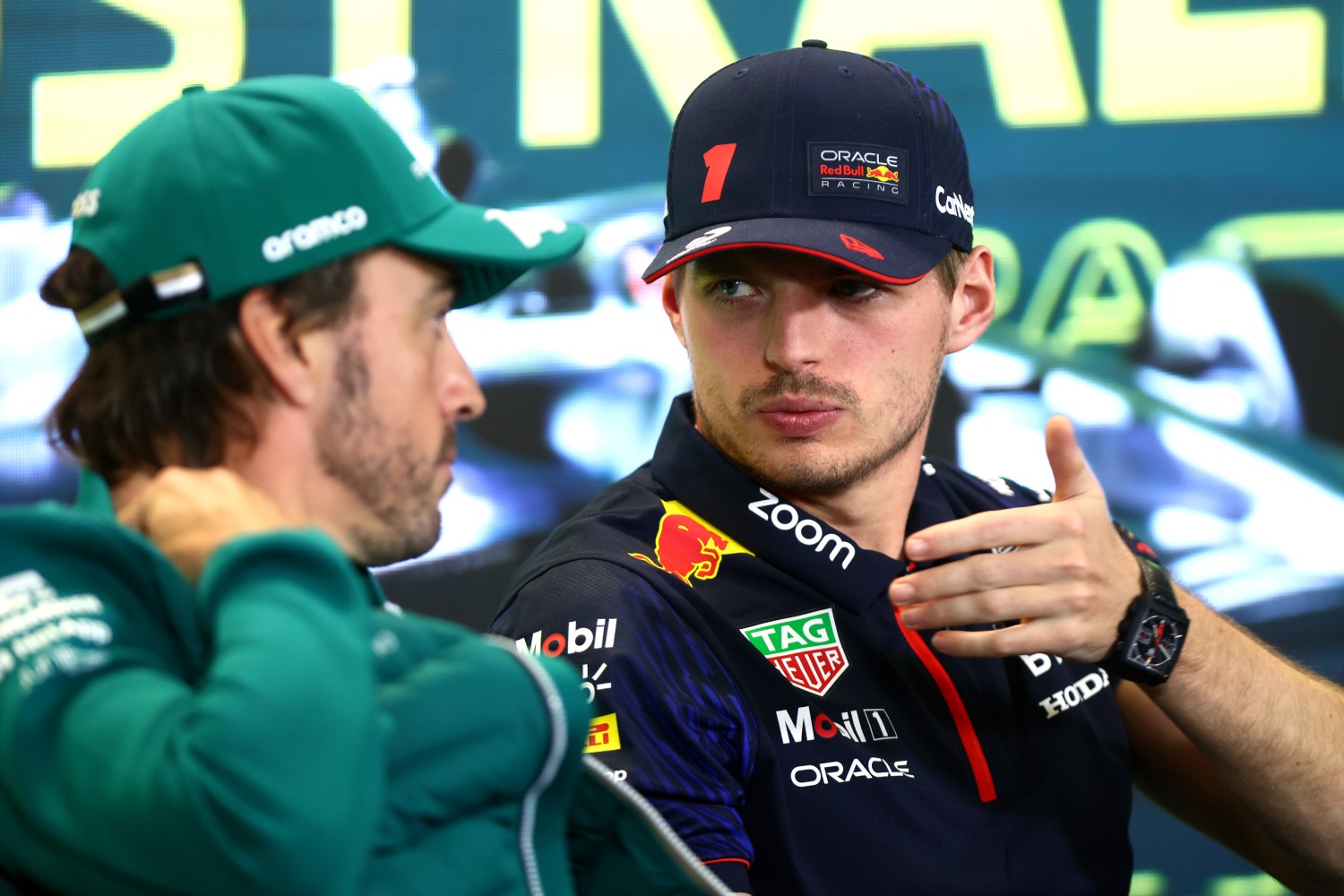 Max Verstappen of the Netherlands and Oracle Red Bull Racing talks with Fernando Alonso of Spain and Aston Martin F1 Team in the Drivers Press Conference during previews ahead of the F1 Grand Prix of Australia at Albert Park Grand Prix Circuit on March 30, 2023 in Melbourne, Australia. (Photo by Dan Istitene/Getty Images) // Getty Images / Red Bull Content Pool