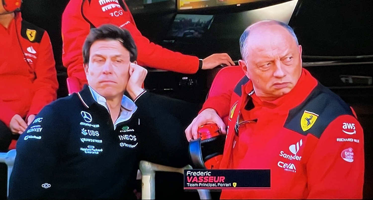 Toto Wolff and Frederic Vasseur look despondent at the Australian GP - their automotive brands being destroyed by a caffeine drink company