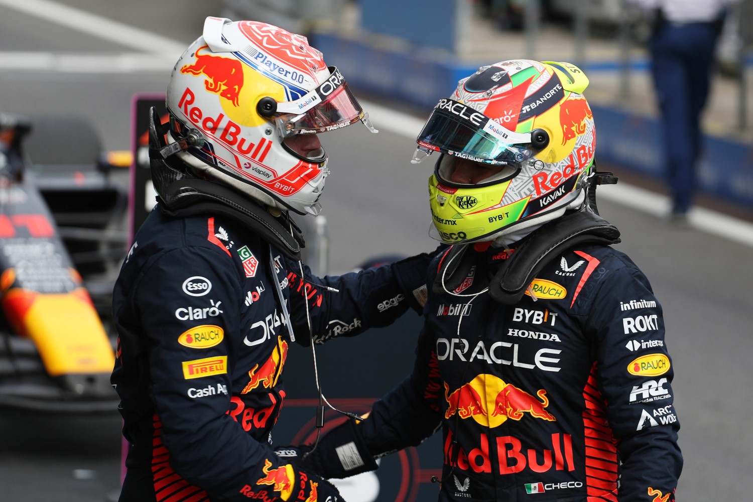 Race winner Max Verstappen of the Netherlands and Oracle Red Bull Racing talks with Third placed Sergio Perez of Mexico and Oracle Red Bull Racing in parc ferme during the F1 Grand Prix of Austria at Red Bull Ring on July 02, 2023 in Spielberg, Austria. (Photo by Peter Fox/Getty Images) // Getty Images / Red Bull Content Pool