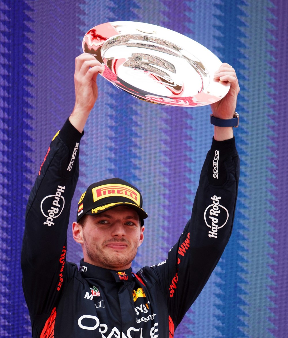 Race winner Max Verstappen of the Netherlands and Oracle Red Bull Racing celebrates on the podium during the F1 Grand Prix of Spain at Circuit de Barcelona-Catalunya on June 04, 2023 in Barcelona, Spain. (Photo by Adam Pretty/Getty Images) // Getty Images / Red Bull Content Pool 