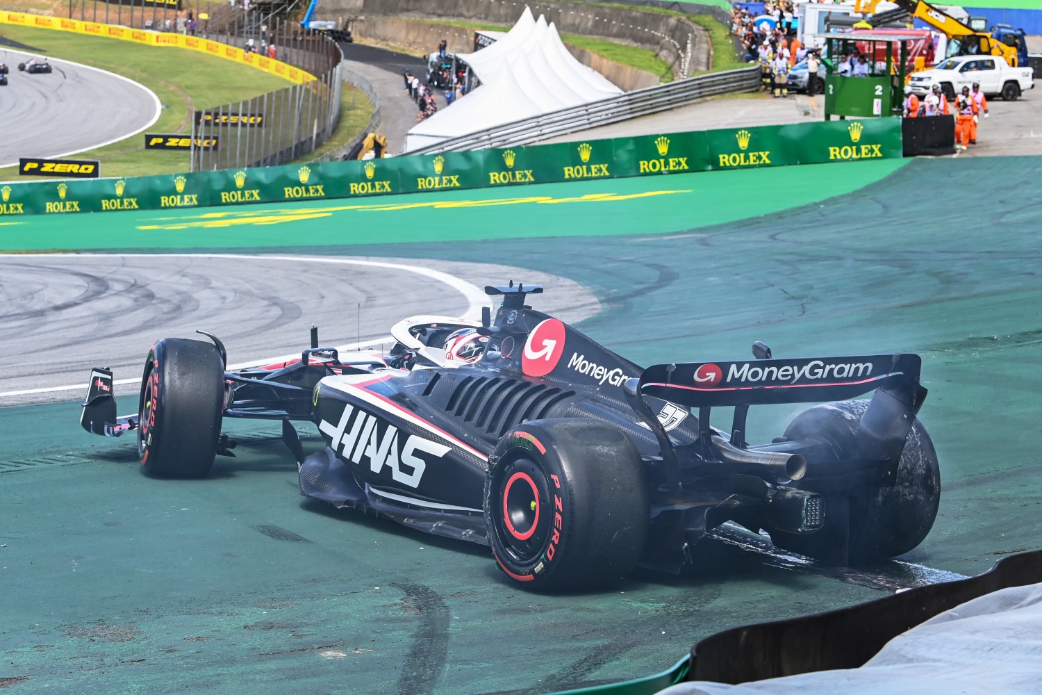 Kevin Magnussen, Haas VF-23, crashes out at the start after contact with Alex Albon, Williams FW45 during the Brazilian GP at Autódromo José Carlos Pace on Sunday November 05, 2023 in Sao Paulo, Brazil. (Photo by Mark Sutton / LAT Images)