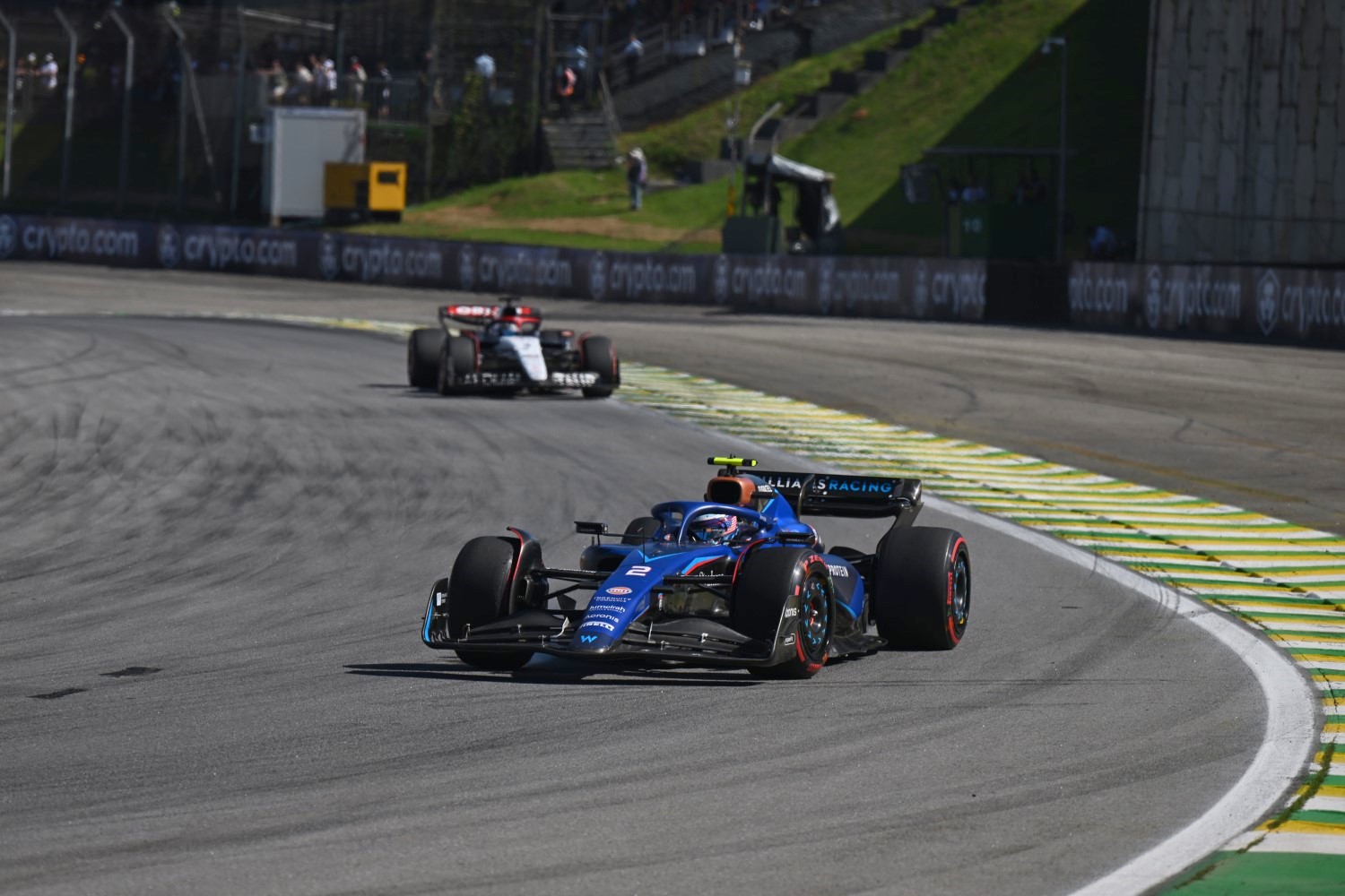 Logan Sargeant, Williams FW45, leads Daniel Ricciardo, AlphaTauri AT04 during the Brazilian GP at Autadromo Jose Carlos Pace on Sunday November 05, 2023 in Sao Paulo, Brazil. (Photo by Simon Galloway / LAT Images)