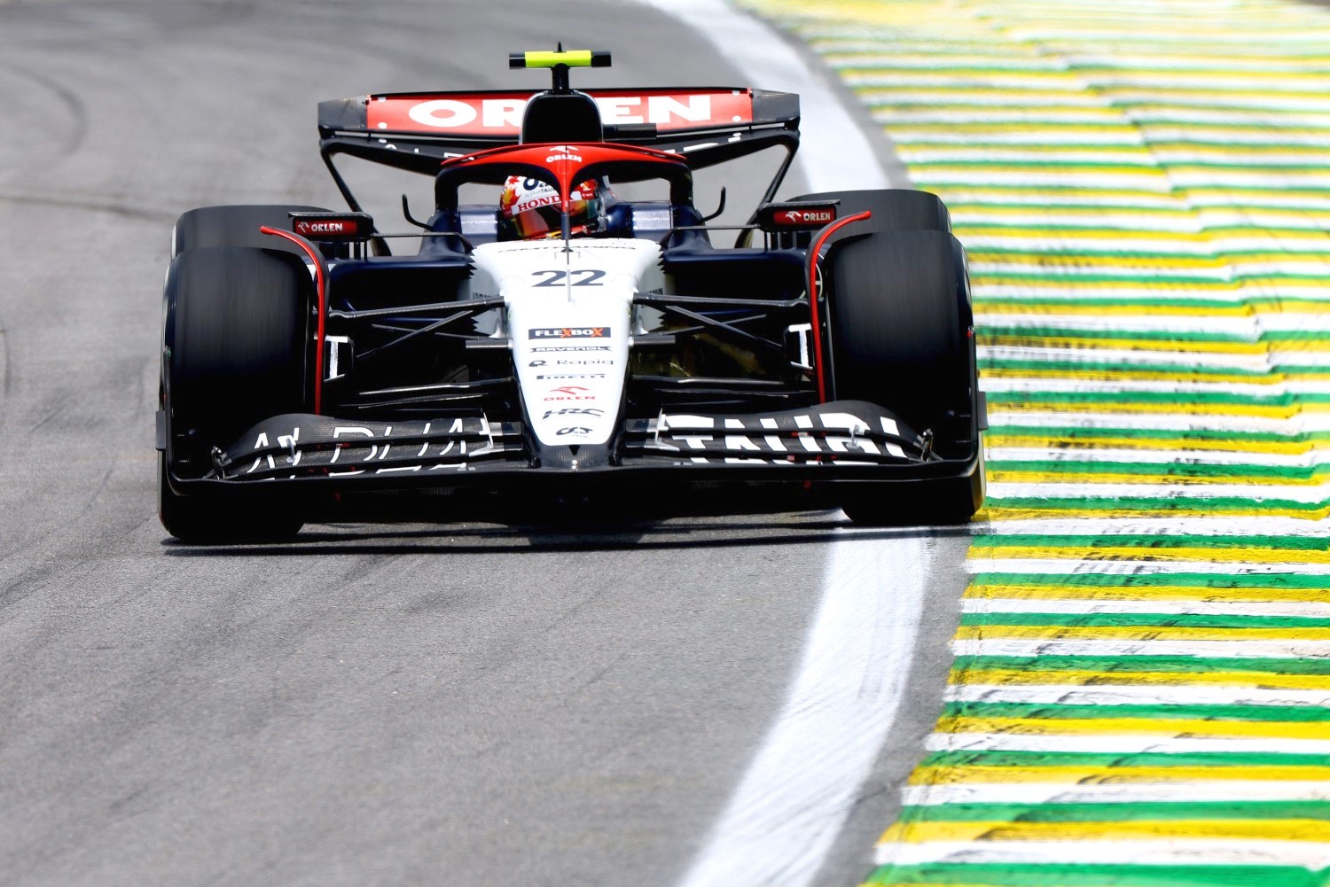 Yuki Tsunoda of Japan driving the (22) Scuderia AlphaTauri AT04 on track during practice ahead of the F1 Grand Prix of Brazil at Autodromo Jose Carlos Pace on November 03, 2023 in Sao Paulo, Brazil. (Photo by Mark Thompson/Getty Images) // Getty Images / Red Bull Content Pool