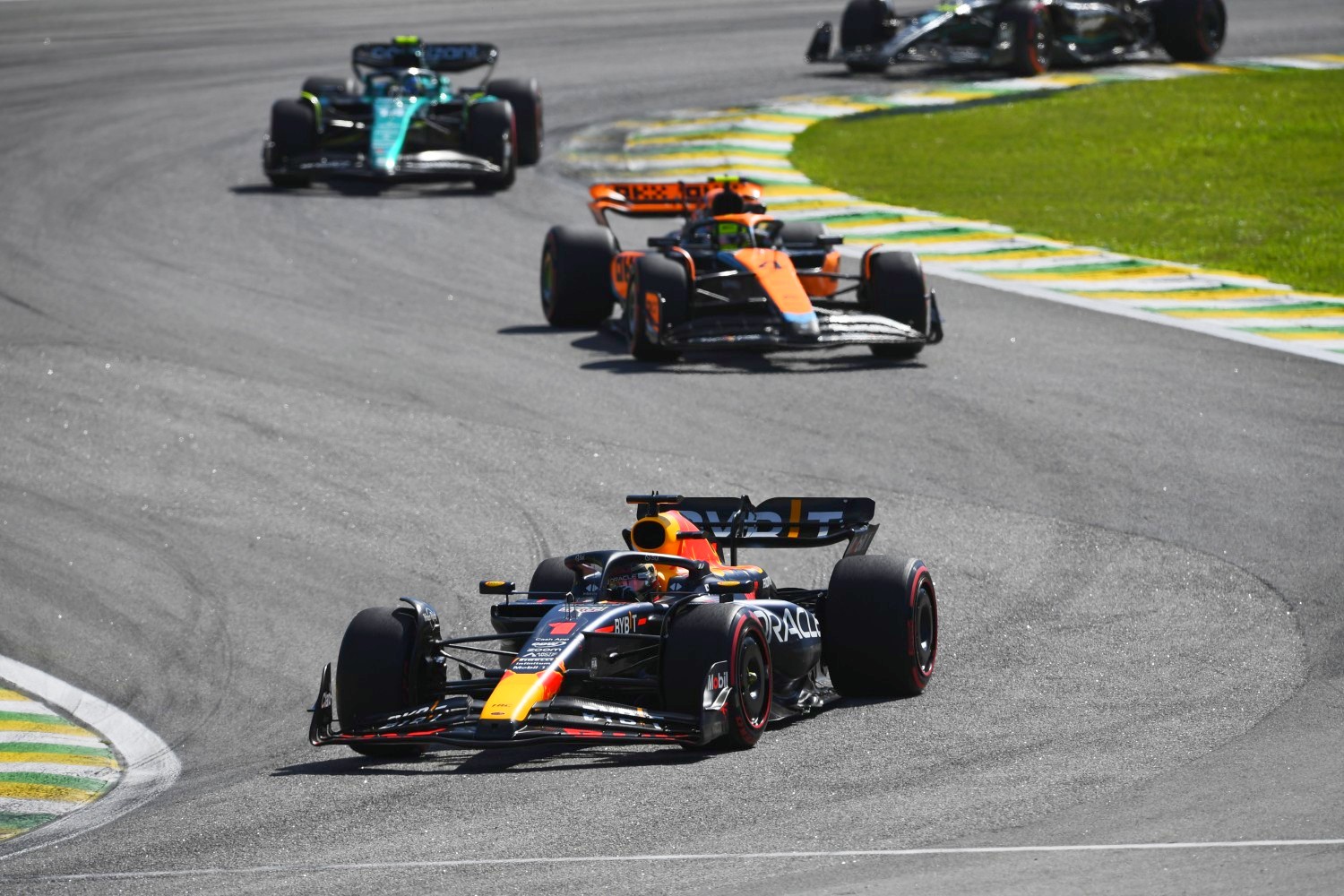 Max Verstappen of the Netherlands driving the (1) Oracle Red Bull Racing RB19 leads Lando Norris of Great Britain driving the (4) McLaren MCL60 Mercedes on track during the F1 Grand Prix of Brazil at Autodromo Jose Carlos Pace on November 05, 2023 in Sao Paulo, Brazil. (Photo by Rudy Carezzevoli/Getty Images)