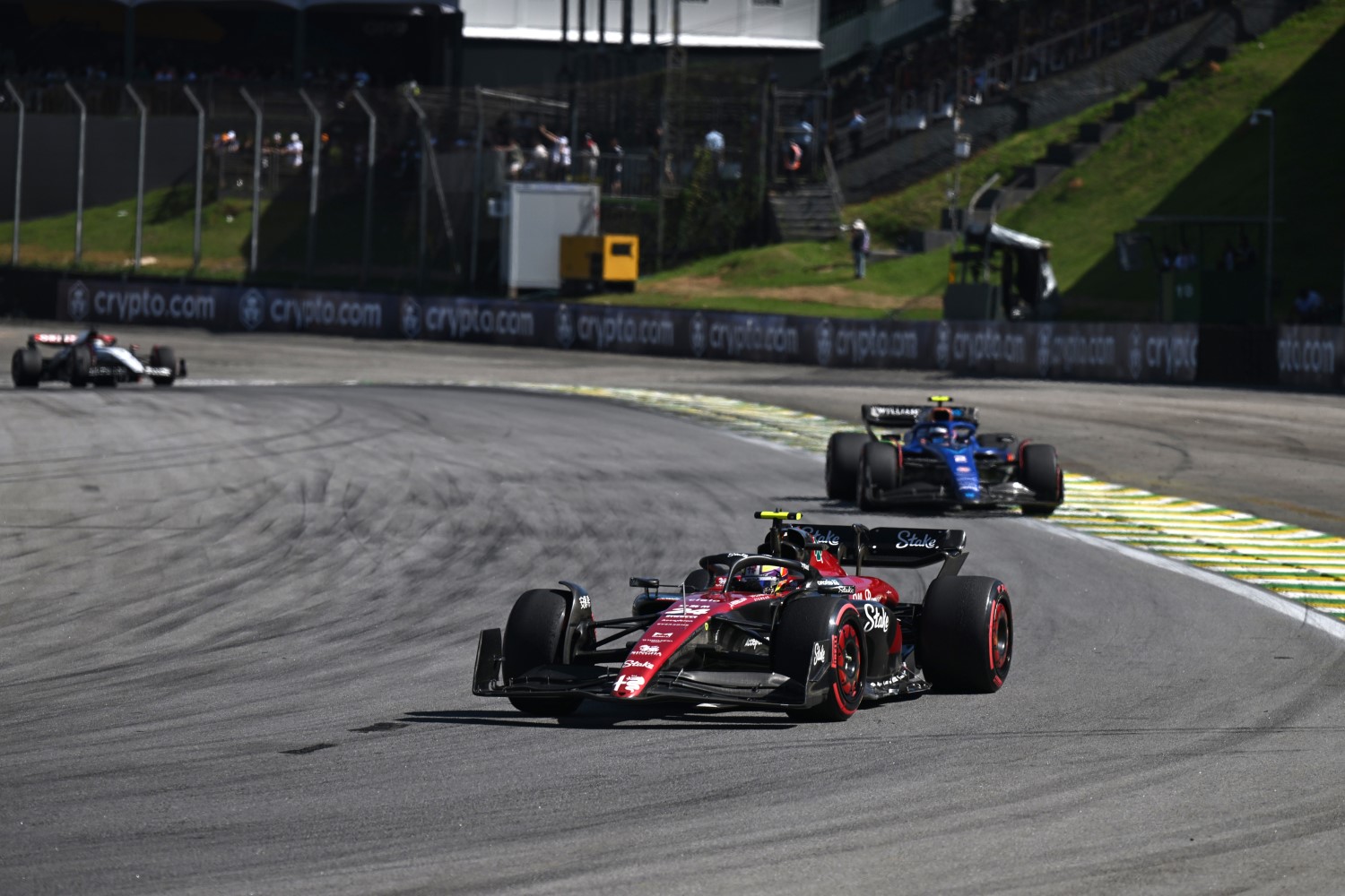 Zhou Guanyu, Alfa Romeo C43, leads Logan Sargeant, Williams FW45 during the Brazilian GP at Autódromo José Carlos Pace on Sunday November 05, 2023 in Sao Paulo, Brazil. (Photo by Simon Galloway / LAT Images)