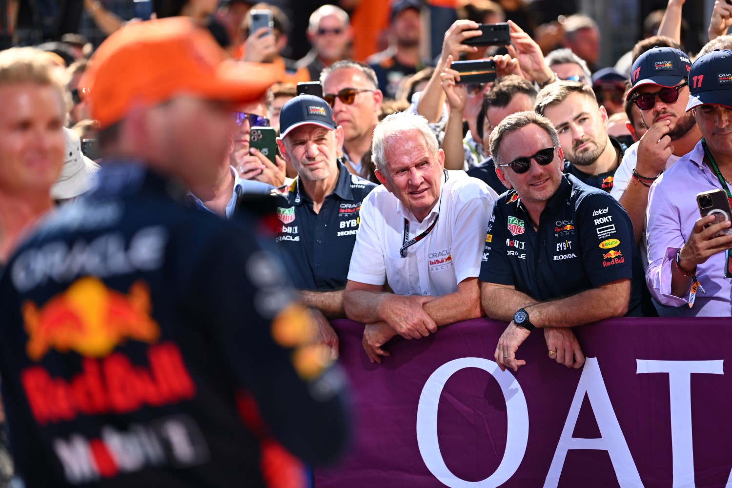 Adrian Newey, the Chief Technical Officer of Red Bull Racing,Red Bull Racing Team Consultant Dr Helmut Marko and Red Bull Racing Team Principal Christian Horner look on as Race winner Max Verstappen of the Netherlands and Oracle Red Bull Racing celebrates in parc ferme during the F1 Grand Prix of Hungary at Hungaroring on July 23, 2023 in Budapest, Hungary. (Photo by Dan Mullan/Getty Images) // Getty Images / Red Bull Content Pool
