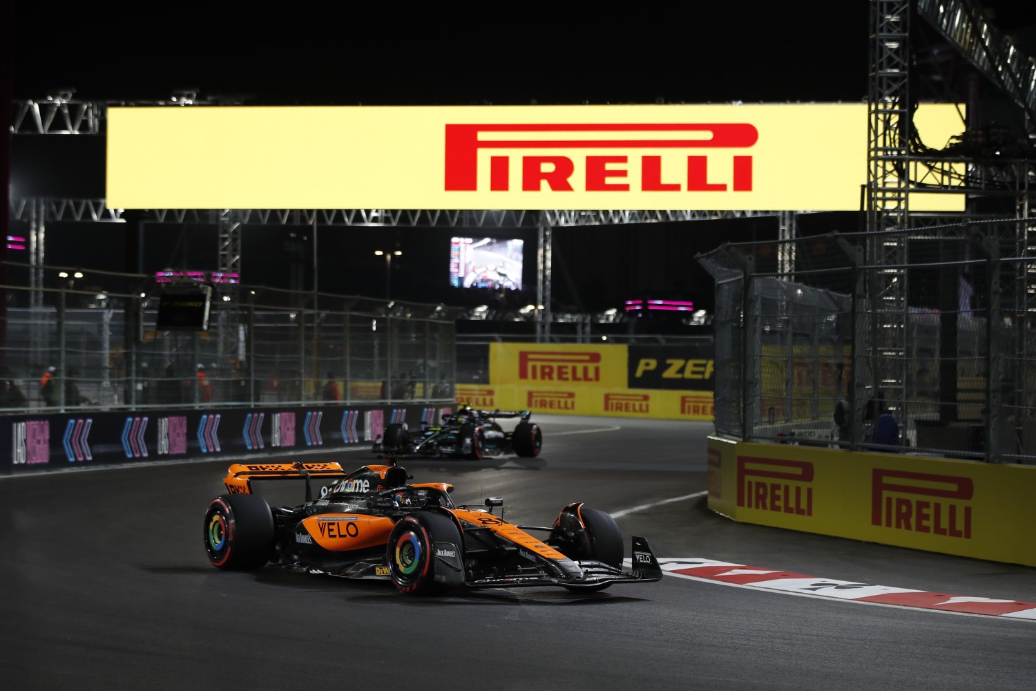 Oscar Piastri, McLaren MCL60, leads Sir Lewis Hamilton, Mercedes F1 W14 during the Las Vegas GP at Streets of Las Vegas on Friday November 17, 2023, United States of America. (Photo by Jake Grant / LAT Images)