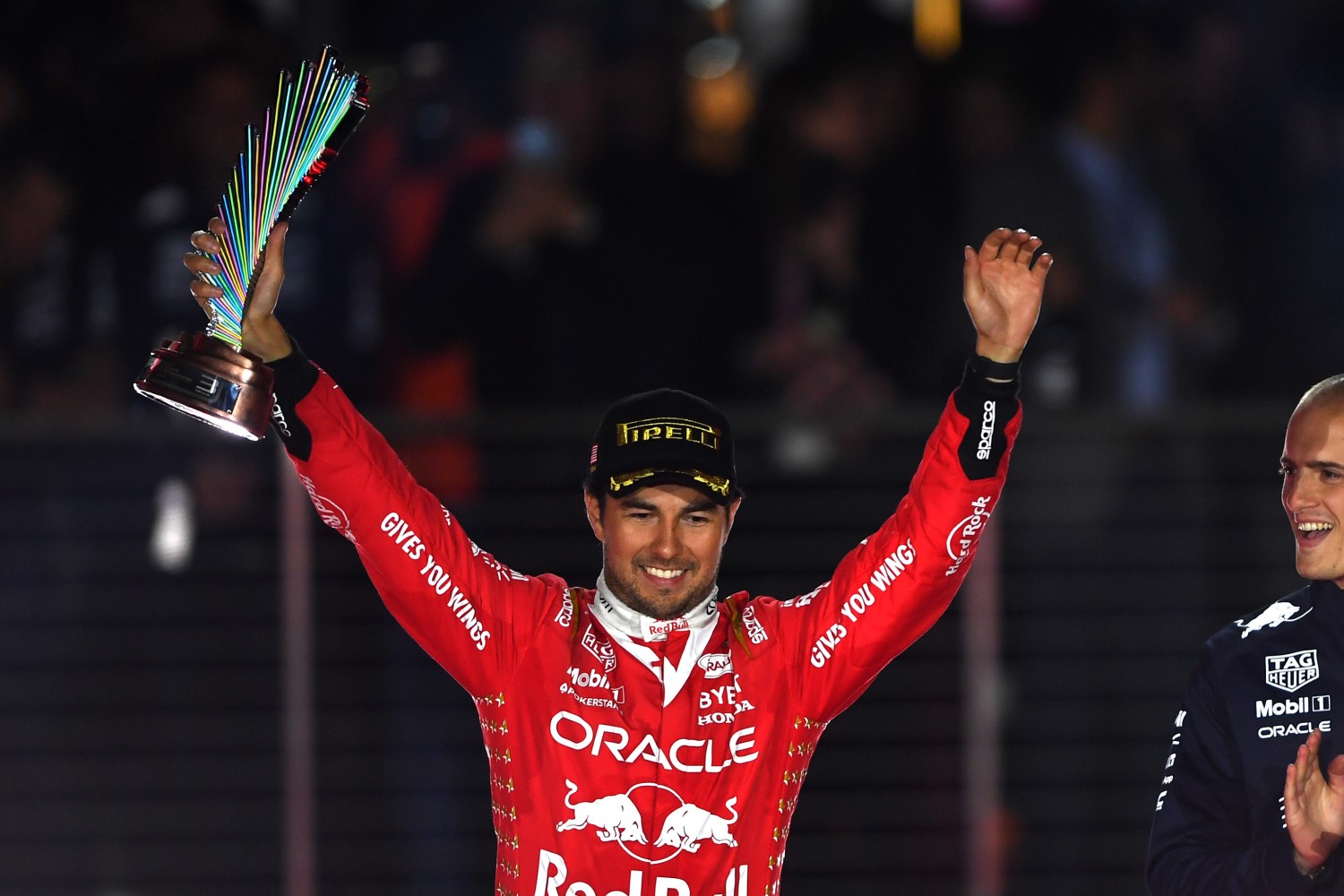 Third placed Sergio Perez of Mexico and Oracle Red Bull Racing looks on from the podium during the F1 Grand Prix of Las Vegas at Las Vegas Strip Circuit on November 18, 2023 in Las Vegas, Nevada. (Photo by Rudy Carezzevoli/Getty Images) // Getty Images / Red Bull Content Pool