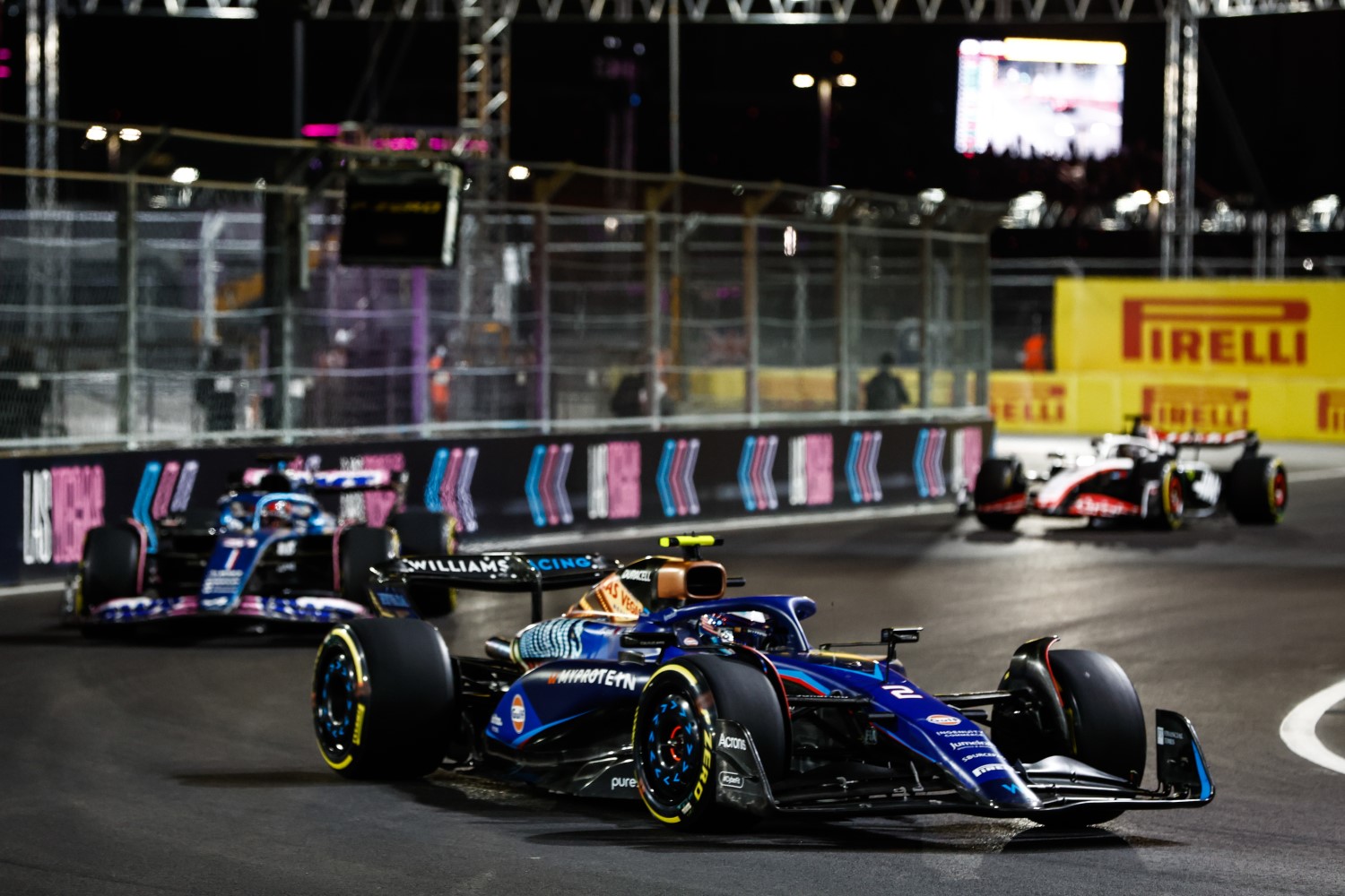 Logan Sargeant, Williams FW45, leads Esteban Ocon, Alpine A523 during the Las Vegas GP at Streets of Las Vegas on Saturday November 18, 2023, United States of America. (Photo by Zak Mauger / LAT Images)