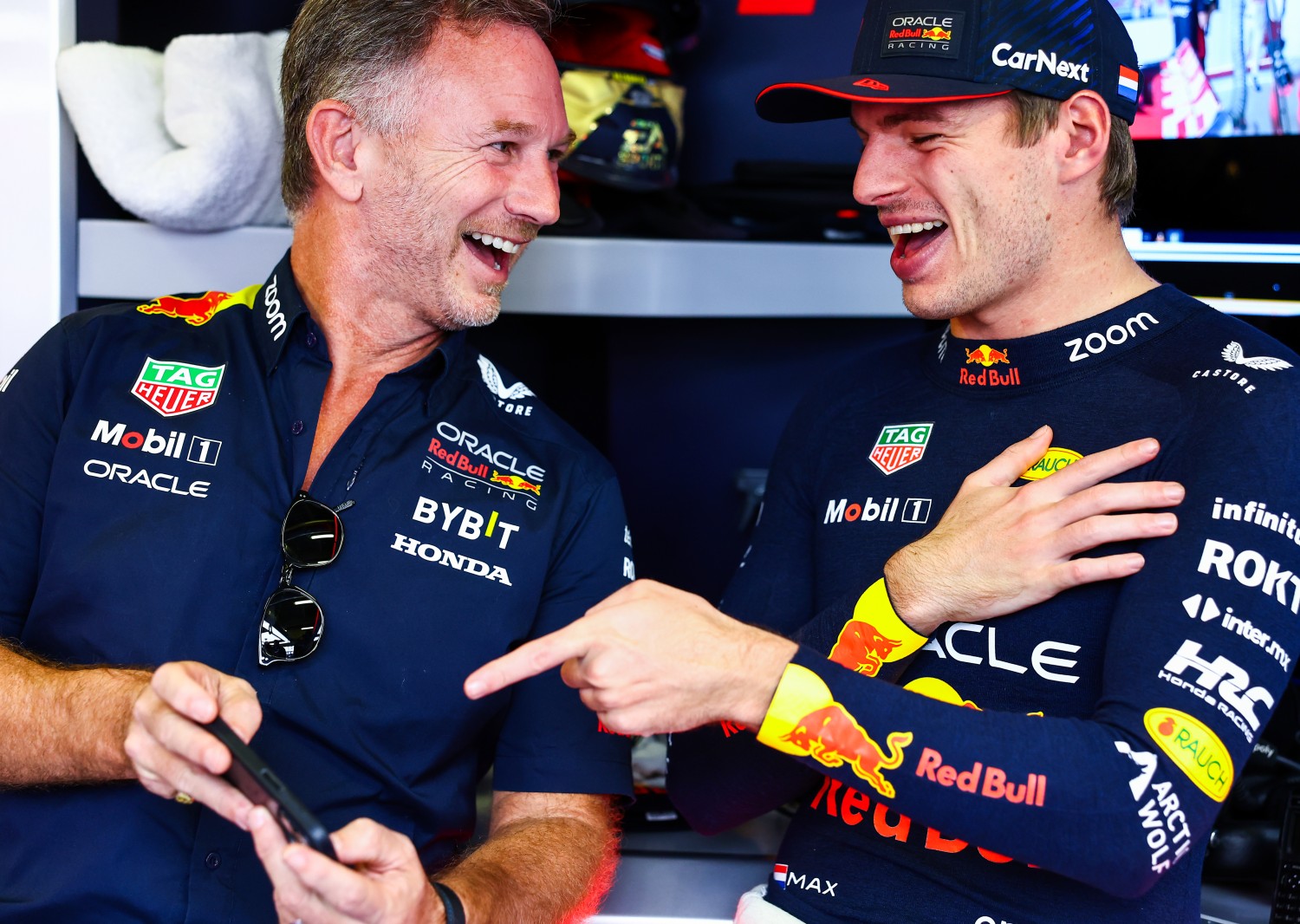 Red Bull Racing Team Principal Christian Horner and Max Verstappen of the Netherlands and Oracle Red Bull Racing talk in the garage prior to practice ahead of the F1 Grand Prix of Mexico at Autodromo Hermanos Rodriguez on October 27, 2023 in Mexico City, Mexico. (Photo by Mark Thompson/Getty Images)