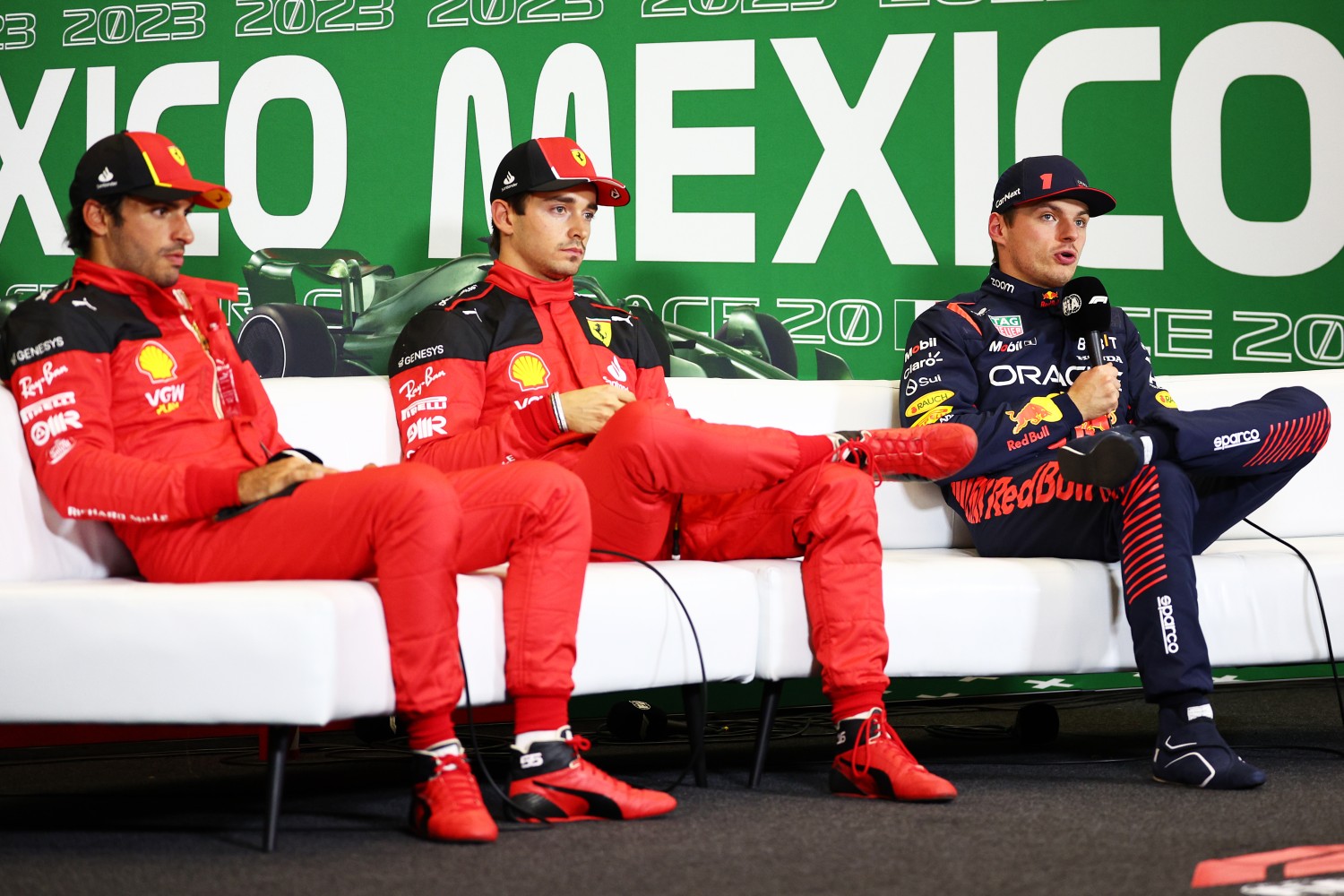 Third placed qualifier Max Verstappen of the Netherlands (R) and Oracle Red Bull Racing talks to the media in a press conference after qualifying ahead of the F1 Grand Prix of Mexico at Autodromo Hermanos Rodriguez on October 28, 2023 in Mexico City, Mexico. (Photo by Jared C. Tilton/Getty Images)