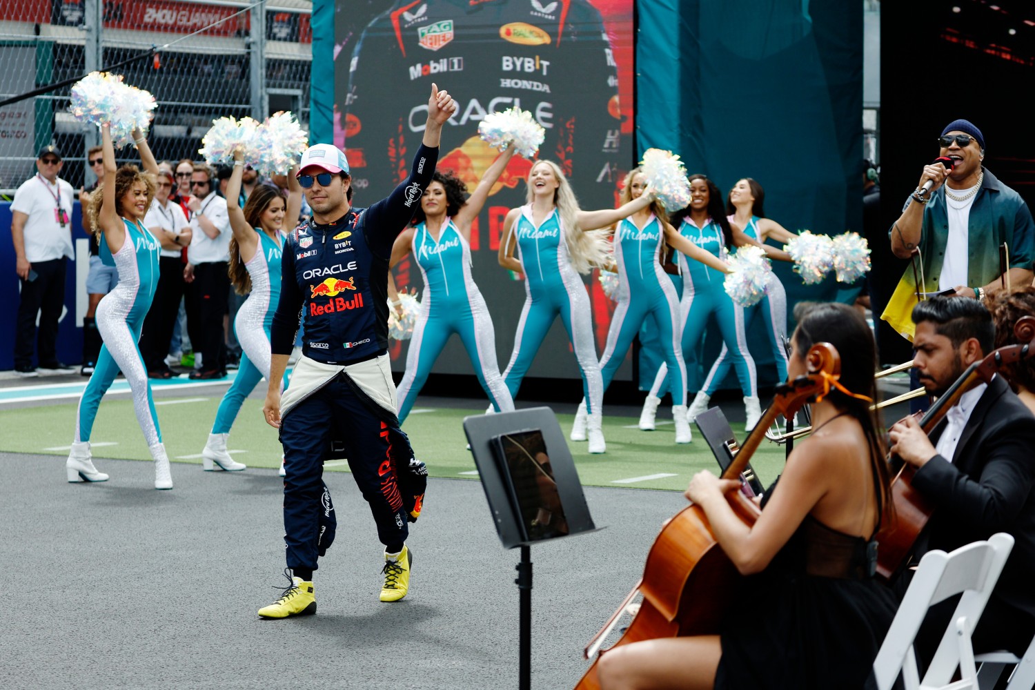 Sergio Perez of Mexico and Oracle Red Bull Racing walks out onto the grid prior to the F1 Grand Prix of Miami at Miami International Autodrome on May 07, 2023 in Miami, Florida. (Photo by Chris Graythen/Getty Images) // Getty Images / Red Bull Content Pool 