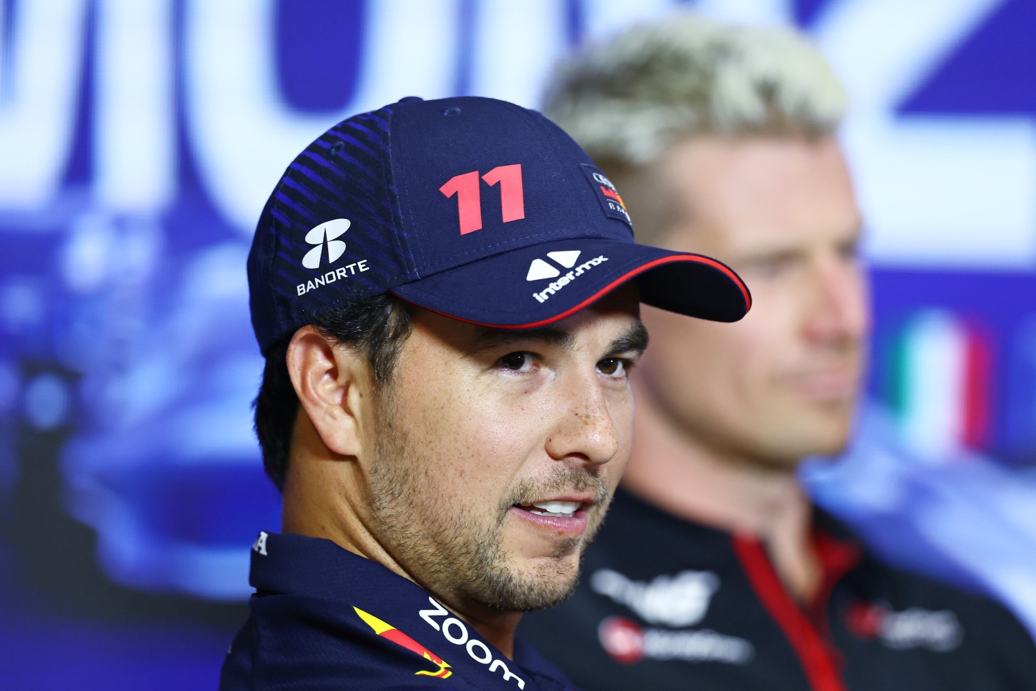 Sergio Perez of Mexico and Oracle Red Bull Racing looks on in the Drivers Press Conference during previews ahead of the F1 Grand Prix of Italy at Autodromo Nazionale Monza on August 31, 2023 in Monza, Italy. (Photo by Bryn Lennon/Getty Images) // Getty Images / Red Bull Content Pool //