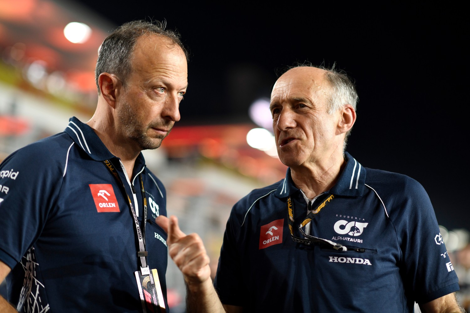 Scuderia AlphaTauri Team Principal Franz Tost talks with Peter Bayer, CEO of Scuderia AlphaTauri on the grid during the Sprint ahead of the F1 Grand Prix of Qatar at Lusail International Circuit on October 07, 2023 in Lusail City, Qatar. (Photo by Rudy Carezzevoli/Getty Images) // Getty Images / Red Bull Content Pool