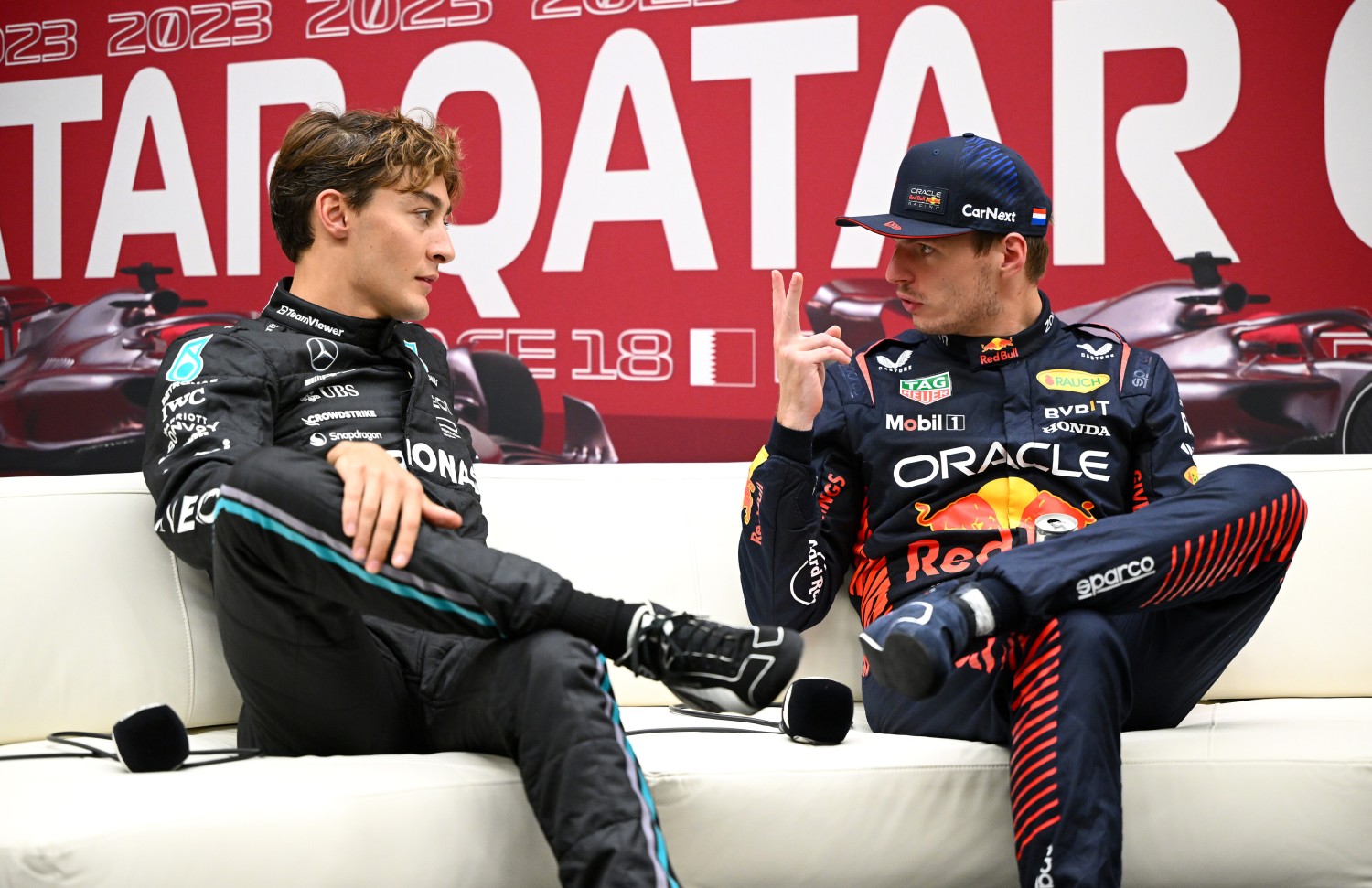 Pole position qualifier Max Verstappen of the Netherlands and Oracle Red Bull Racing and Second placed qualifier George Russell of Great Britain and Mercedes attend the press conference after qualifying ahead of the F1 Grand Prix of Qatar at Lusail International Circuit on October 06, 2023 in Lusail City, Qatar. (Photo by Clive Mason/Getty Images) // Getty Images / Red Bull Content Pool