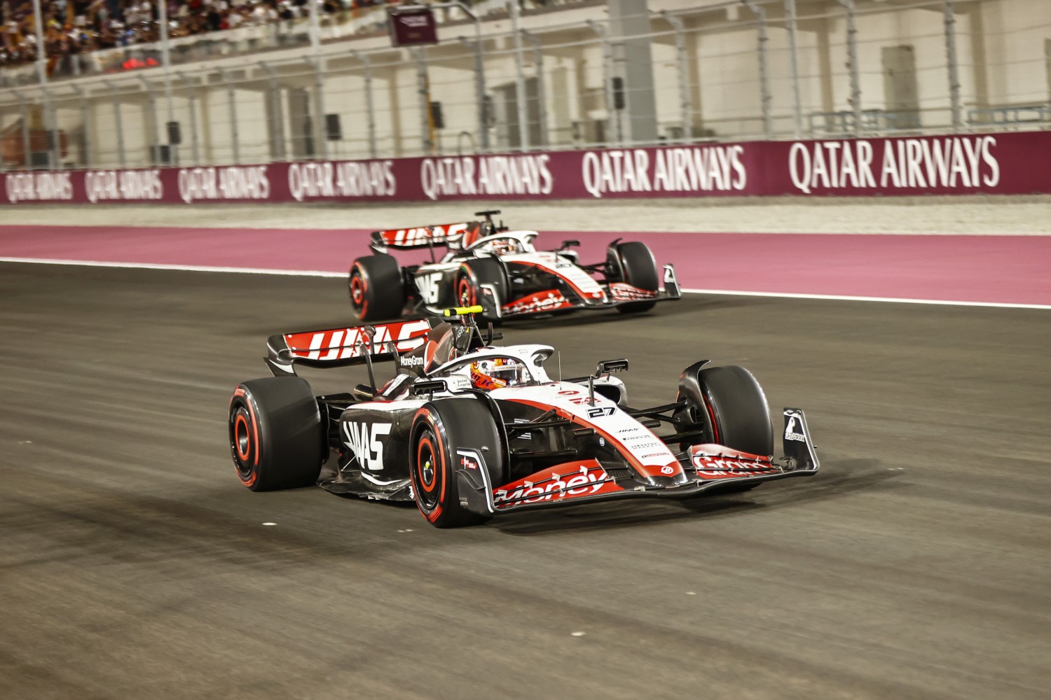 Nico Hulkenberg, Haas VF-23, leads Kevin Magnussen, Haas VF-23 during the Qatar GP at Losail International Circuit on Friday October 06, 2023 in Losail, Qatar. (Photo by Andy Hone / LAT Images)
