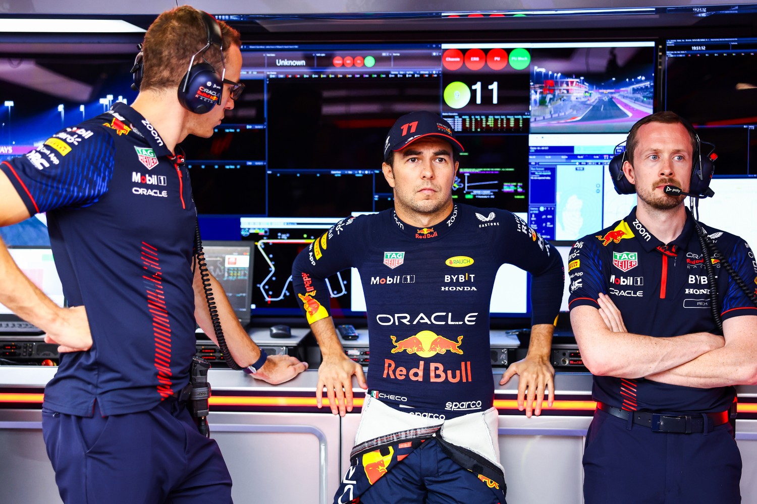 Sergio Perez of Mexico and Oracle Red Bull Racing prepares to drive in the garage prior to the Sprint ahead of the F1 Grand Prix of Qatar at Lusail International Circuit on October 07, 2023 in Lusail City, Qatar. (Photo by Mark Thompson/Getty Images) // Getty Images / Red Bull Content Pool