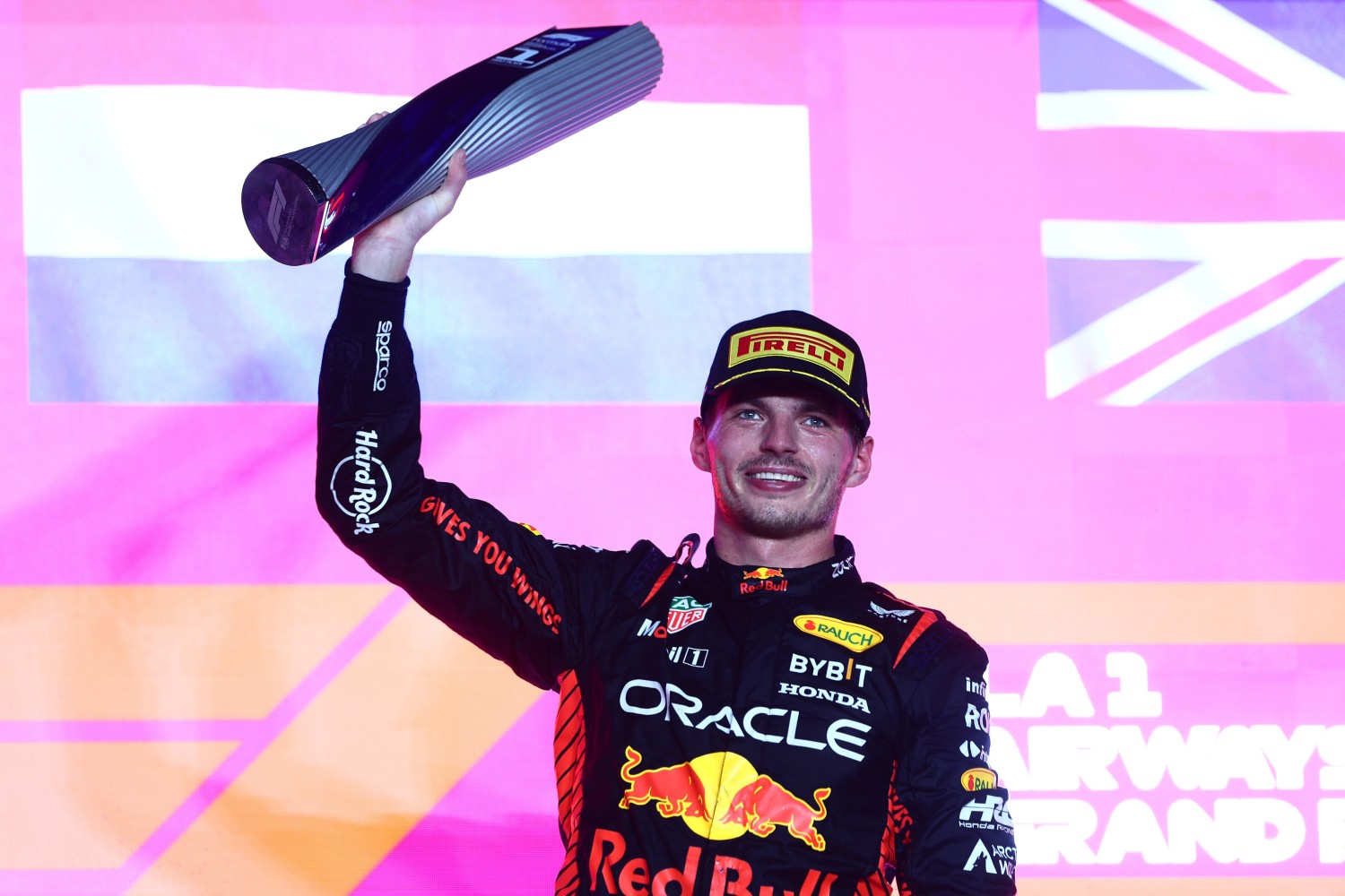 Race winner Max Verstappen of the Netherlands and Oracle Red Bull Racing celebrates on the podium during the F1 Grand Prix of Qatar at Lusail International Circuit on October 08, 2023 in Lusail City, Qatar. (Photo by Clive Rose/Getty Images) // Getty Images / Red Bull Content Pool