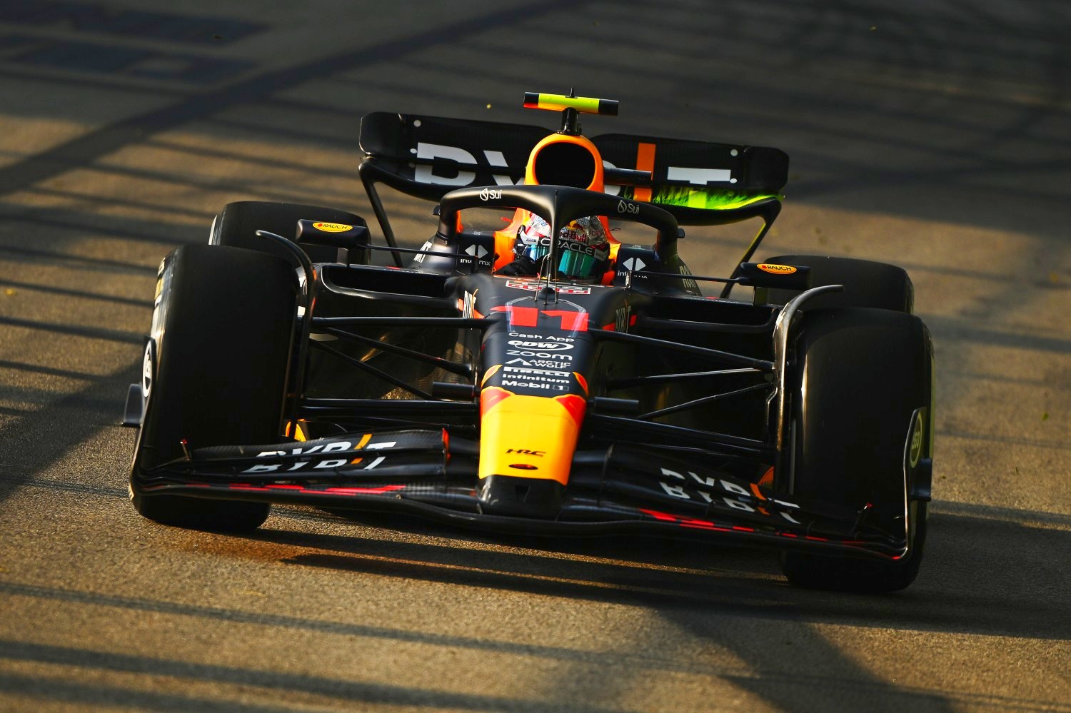 Sergio Perez of Mexico driving the (11) Oracle Red Bull Racing RB19 on track during practice ahead of the F1 Grand Prix of Singapore at Marina Bay Street Circuit on September 15, 2023 in Singapore, Singapore. (Photo by Clive Mason/Getty Images) // Getty Images / Red Bull Content Pool