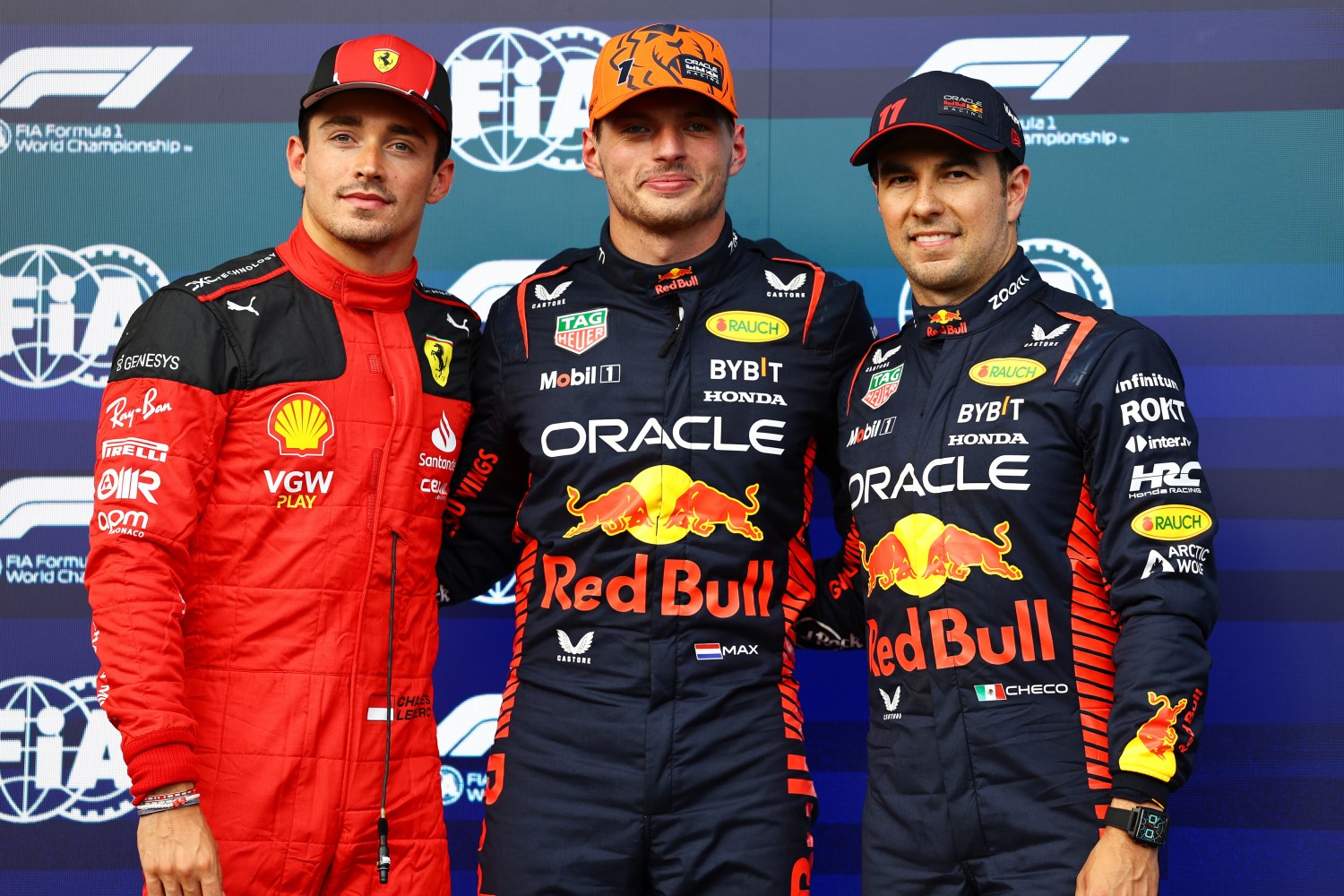 Pole position qualifier Max Verstappen of the Netherlands and Oracle Red Bull Racing (C), Second placed qualifier Charles Leclerc of Monaco and Ferrari (L) and Third placed qualifier Sergio Perez of Mexico and Oracle Red Bull Racing (R) pose for a photo in parc ferme during qualifying ahead of the F1 Grand Prix of Belgium at Circuit de Spa-Francorchamps on July 28, 2023 in Spa, Belgium. (Photo by Mark Thompson/Getty Images) // Getty Images / Red Bull Content Pool