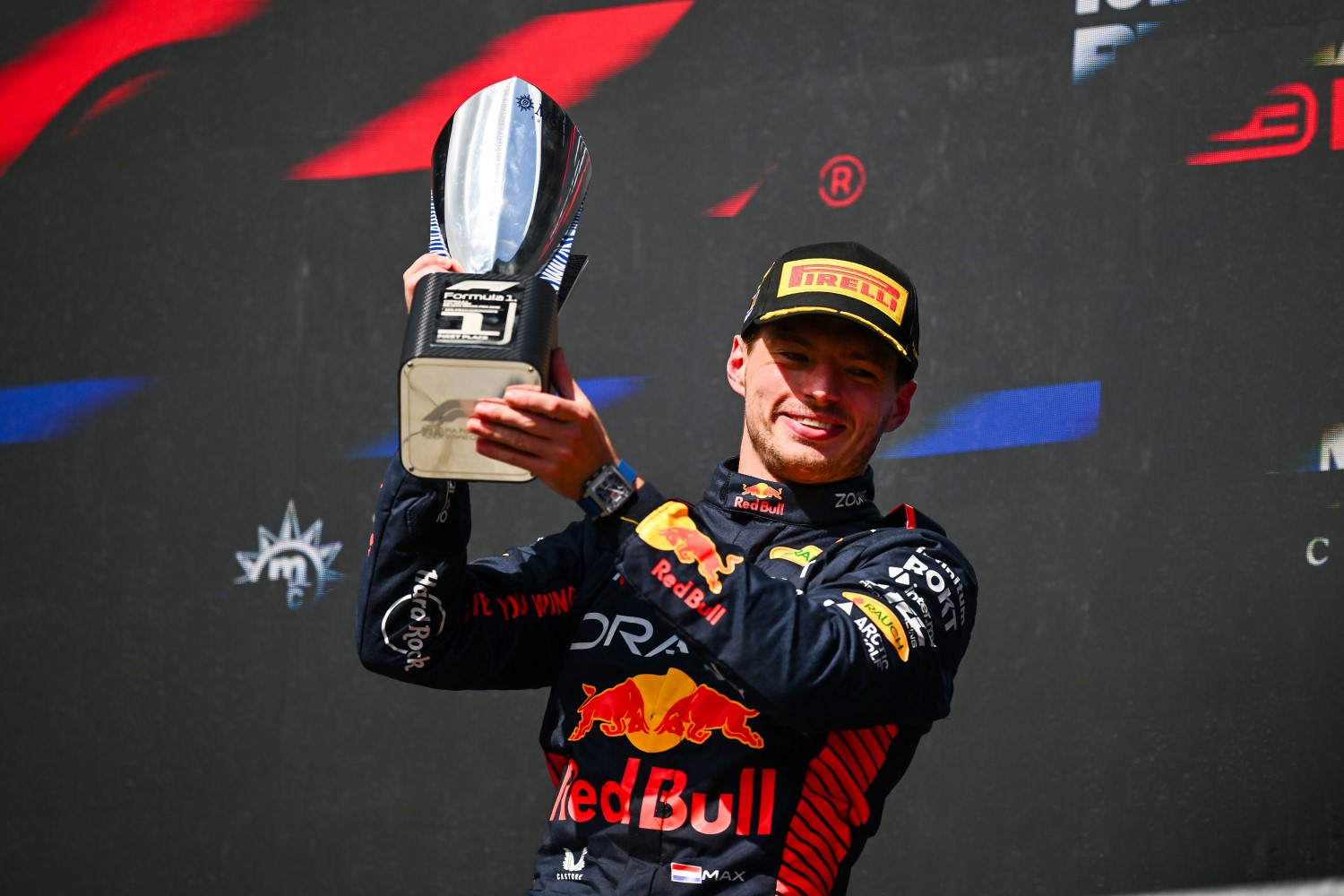 Race winner Max Verstappen of the Netherlands and Oracle Red Bull Racing celebrates on the podium during the F1 Grand Prix of Belgium at Circuit de Spa-Francorchamps on July 30, 2023 in Spa, Belgium. (Photo by Dan Mullan/Getty Images) // Getty Images / Red Bull Content Pool