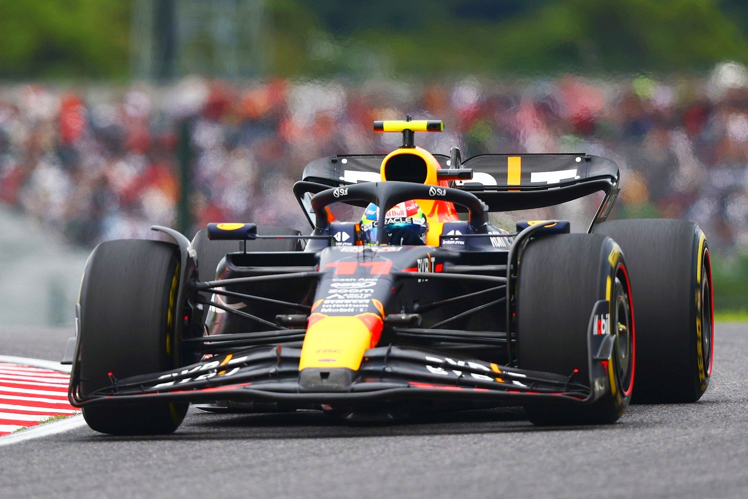 Sergio Perez of Mexico driving the (11) Oracle Red Bull Racing RB19 on track during practice ahead of the F1 Grand Prix of Japan at Suzuka International Racing Course on September 22, 2023 in Suzuka, Japan. (Photo by Clive Rose/Getty Images)