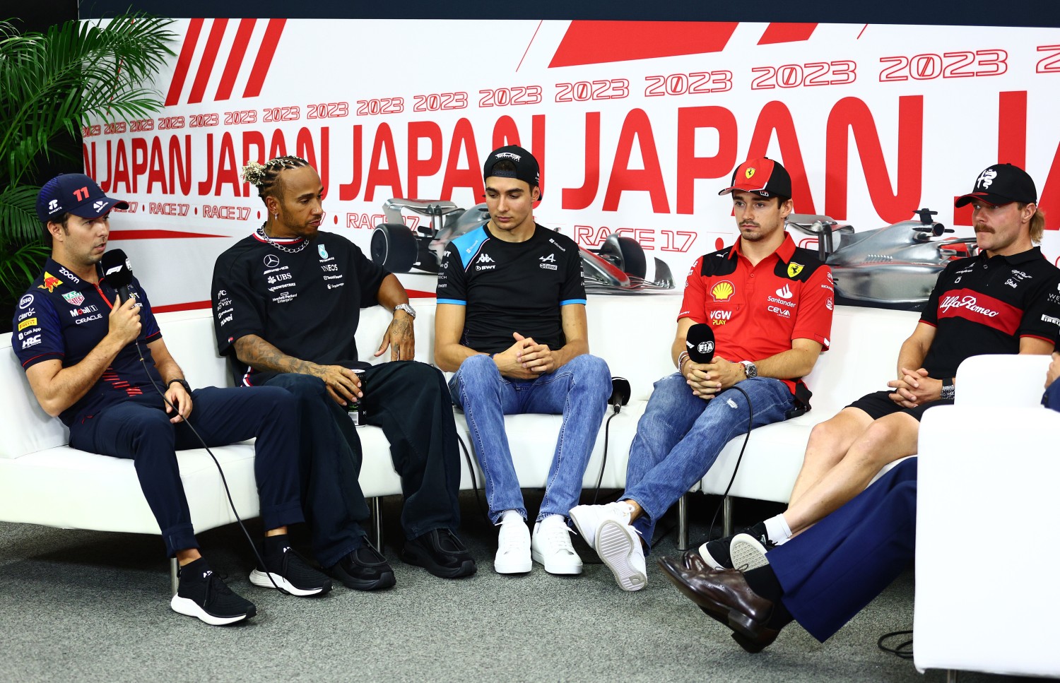 Sergio Perez of Mexico and Oracle Red Bull Racing, Lewis Hamilton of Great Britain and Mercedes, Esteban Ocon of France and Alpine F1,Charles Leclerc of Monaco and Ferrari and Valtteri Bottas of Finland and Alfa Romeo F1 attend the Drivers Press Conference during previews ahead of the F1 Grand Prix of Japan at Suzuka International Racing Course on September 21, 2023 in Suzuka, Japan. (Photo by Clive Rose/Getty Images) // Getty Images / Red Bull Content Pool