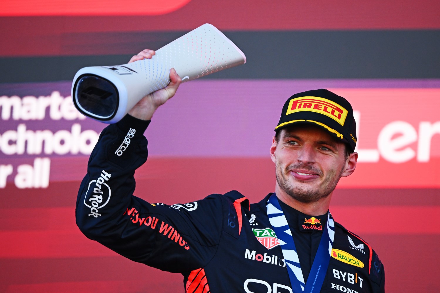 Race winner Max Verstappen of the Netherlands and Oracle Red Bull Racing celebrates on the podium during the F1 Grand Prix of Japan at Suzuka International Racing Course on September 24, 2023 in Suzuka, Japan. (Photo by Clive Mason/Getty Images) // Getty Images / Red Bull Content Pool