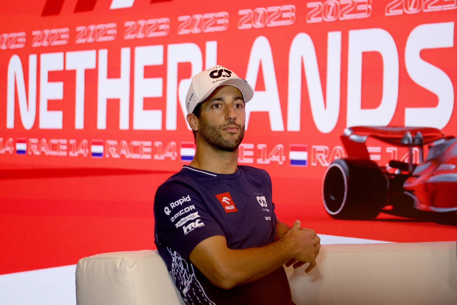 Daniel Ricciardo of Australia and Scuderia AlphaTauri attends the Drivers Press Conference during previews ahead of the F1 Grand Prix of The Netherlands at Circuit Zandvoort on August 24, 2023 in Zandvoort, Netherlands. (Photo by Dean Mouhtaropoulos/Getty Images) // Getty Images / Red Bull Content Pool //