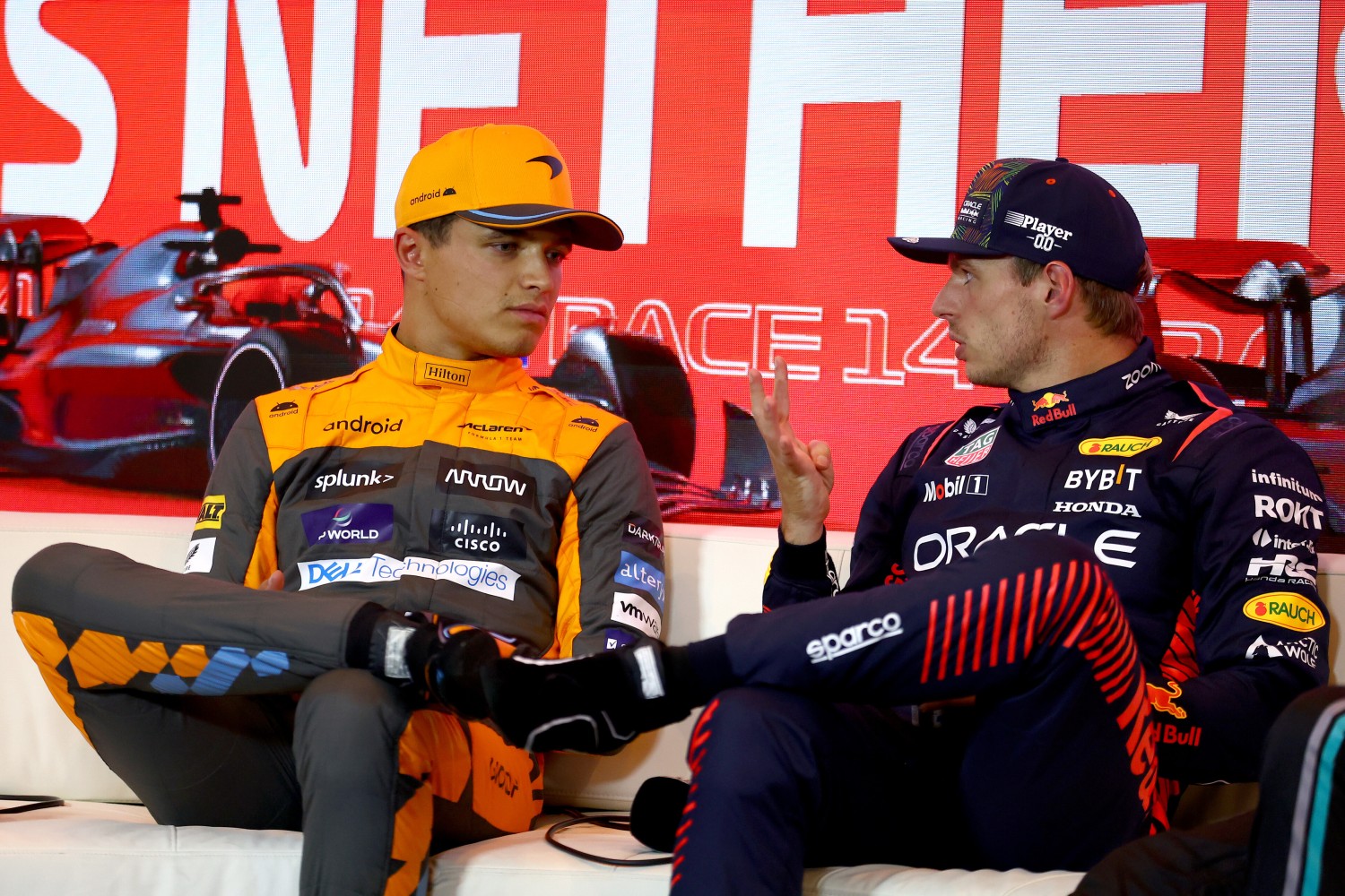 Pole position qualifier Max Verstappen of the Netherlands and Oracle Red Bull Racing (R), Second placed qualifier Lando Norris of Great Britain and McLaren (L) and attend the press conference after qualifying ahead of the F1 Grand Prix of The Netherlands at Circuit Zandvoort on August 26, 2023 in Zandvoort, Netherlands. (Photo by Bryn Lennon/Getty Images) // Getty Images / Red Bull Content Pool