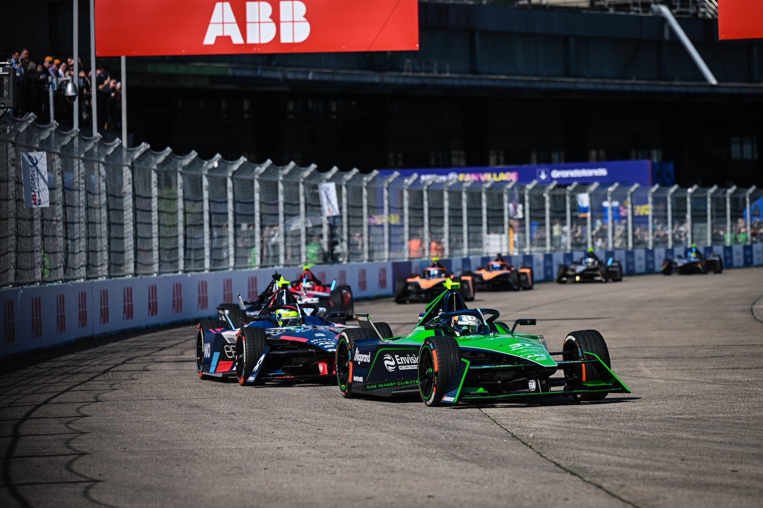 BERLIN TEMPELHOF AIRPORT, GERMANY - APRIL 22: Nick Cassidy, Envision Racing, Jaguar I-TYPE 6 leads Sergio Sette Camara, NIO 333 FE Team, NIO 333 ER9 during the Berlin ePrix at Berlin Tempelhof Airport on Saturday April 22, 2023 in Berlin, Germany. (Photo by Simon Galloway / LAT Images)
