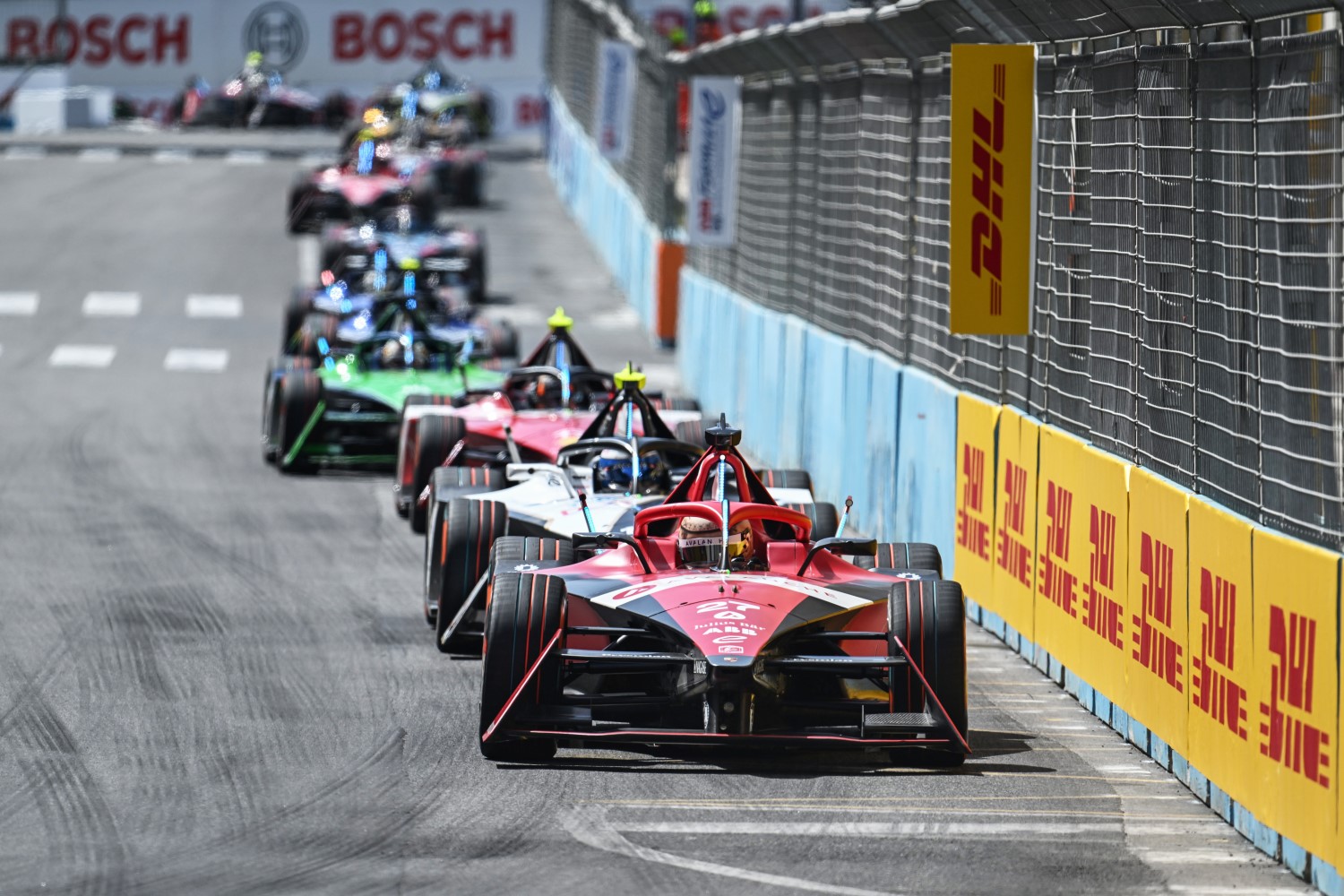 Jake Dennis, Avalanche Andretti Formula E, Porsche 99 X Electric Gen3, leads Sam Bird, Jaguar TCS Racing, Jaguar I-TYPE 6 during the Rome ePrix II at Circuito Cittadino dell'EUR on Sunday July 16, 2023 in Rome, Italy. (Photo by Sam Bagnall / LAT Images)