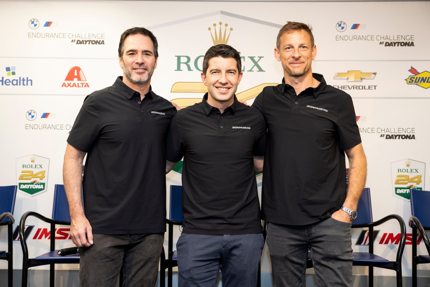 Drivers Jimmie Johnson, Mike Rockenfeller, and Jenson Button pose for a photo after a press conference announcing the NASCAR Garage 56 driver lineup for entry in 2023 Le Mans before the Rolex 24 at Daytona International Speedway on January 28, 2023 in Daytona Beach, Florida. (Photo by James Gilbert/Getty Images)