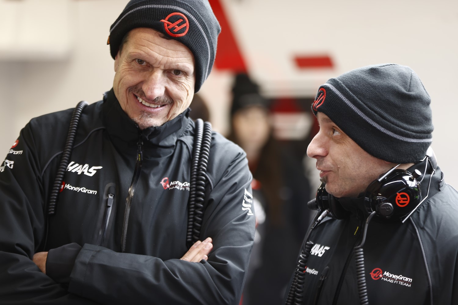 Haas team boss Guenther Steiner talks to Haas Chief Design Engineer Simone Resta - photo by LAT/Andy Hone