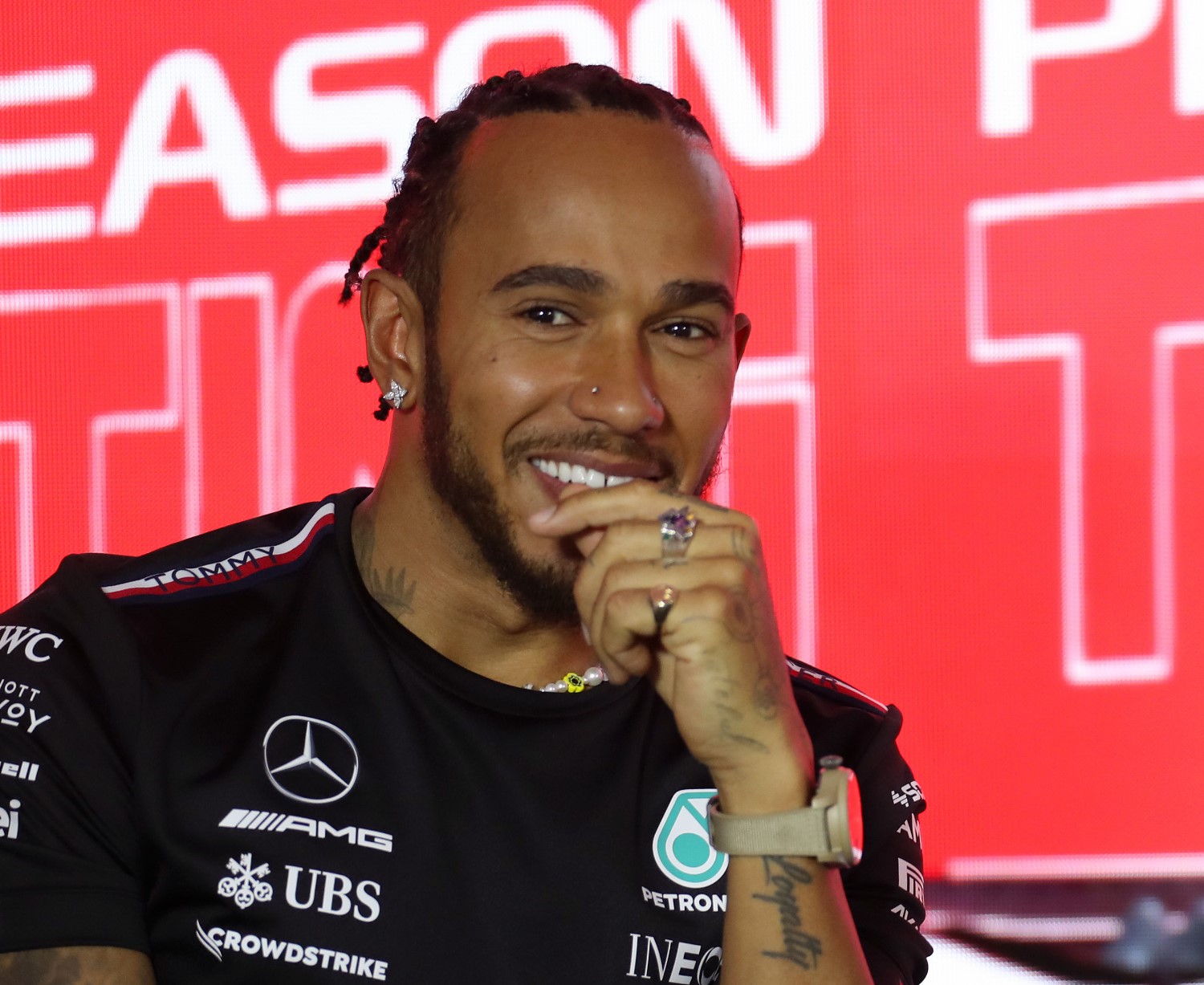Lewis Hamilton laughs when hearing that Massa's lawyers want his help in taking away his own 2008 driver title. (Photo by Peter Fox/Getty Images) // Getty Images / Red Bull Content Pool