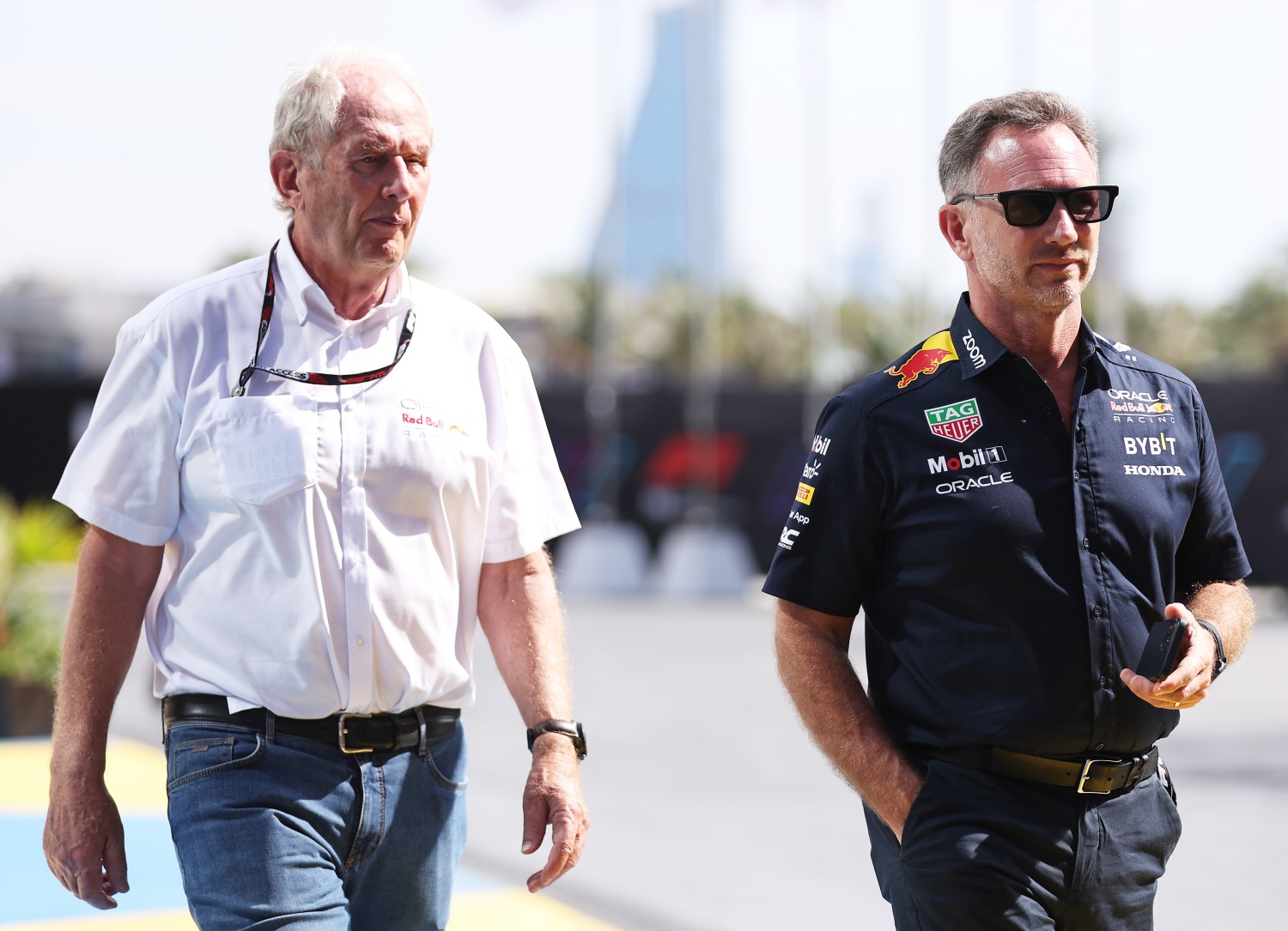 Red Bull Racing Team Consultant Dr Helmut Marko and Red Bull Racing Team Principal Christian Horner walk in the Paddock prior to final practice ahead of the F1 Grand Prix of Saudi Arabia at Jeddah Corniche Circuit on March 18, 2023 in Jeddah, Saudi Arabia. (Photo by Lars Baron/Getty Images) // Getty Images / Red Bull Content Pool