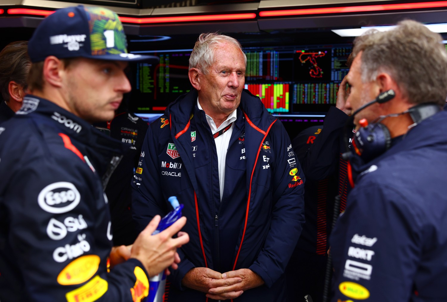 Red Bull Racing Team Consultant Dr Helmut Marko talks in the garage during a red flag delay during the F1 Grand Prix of The Netherlands at Circuit Zandvoort on August 27, 2023 in Zandvoort, Netherlands. (Photo by Mark Thompson/Getty Images)