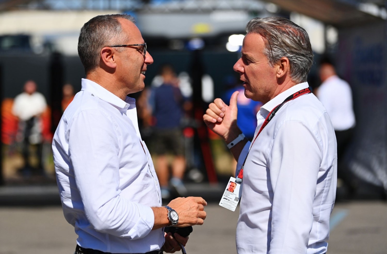 F1 CEO Stefano Domincali talks with Max Verstappen's manager Raymond Vermeulen