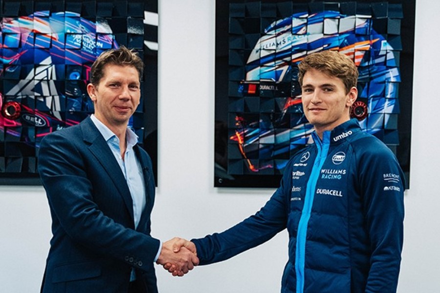 Williams Team Boss James Vowles and Logan Sargeant shake of 2024.